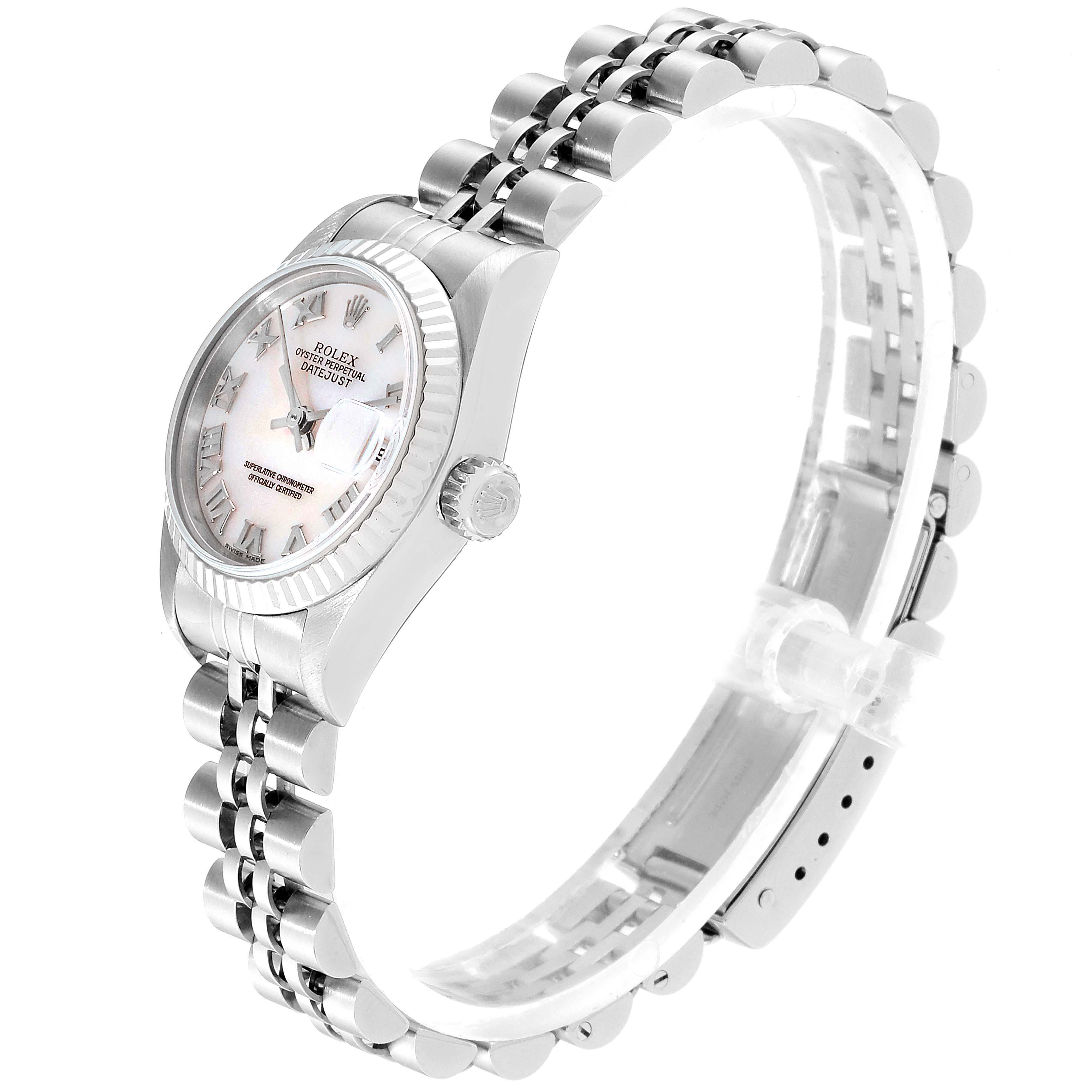 The image shows a side angle of a Rolex Datejust 79174 Women
s Stainless Steel Mother of Pearl Dial 79174 Women
s Stainless Steel Mother of Pearl Dial watch, highlighting the face, bezel, crown, and part of the bracelet.