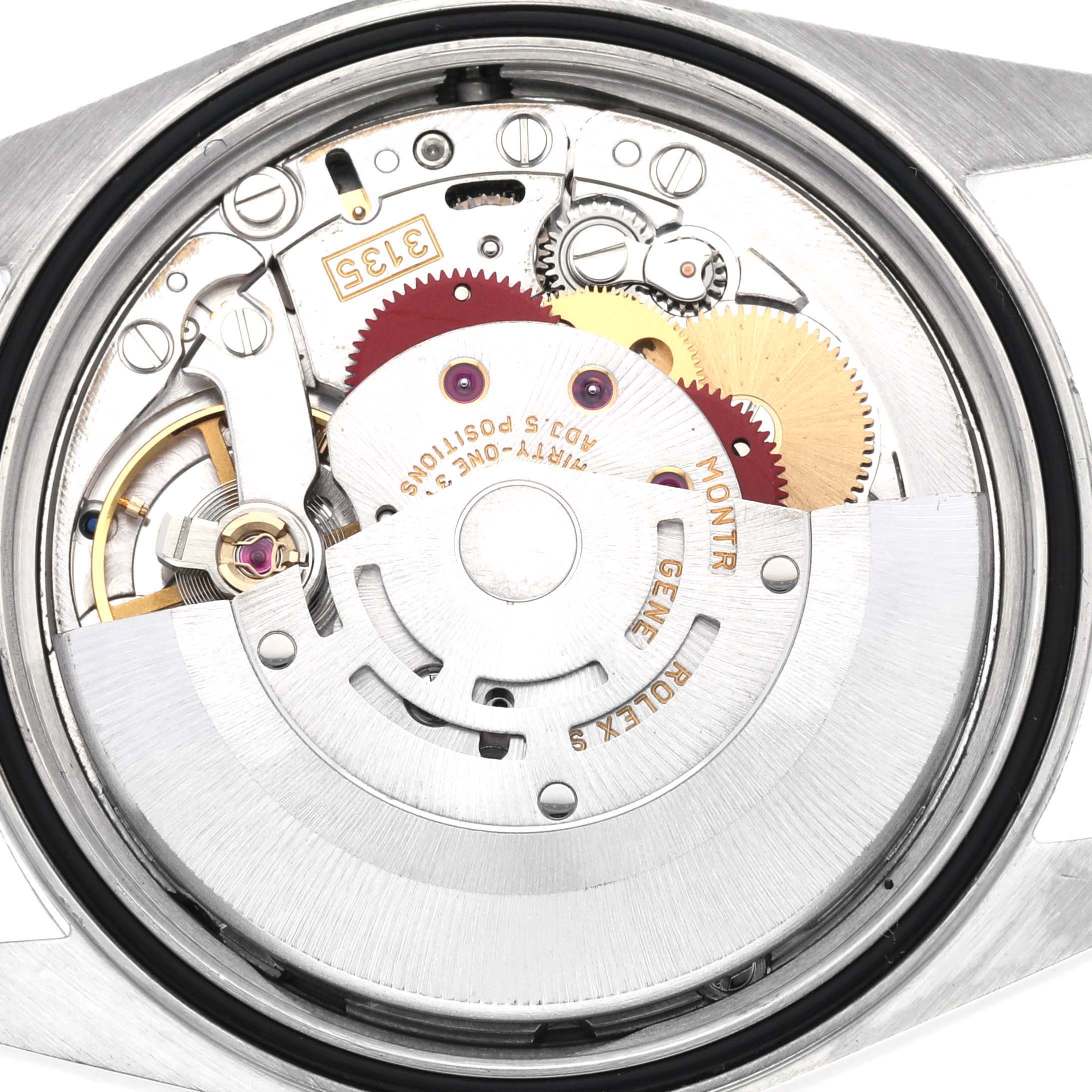The image shows the intricate movement mechanism from the back of a Rolex Datejust model 16200 men's watch.