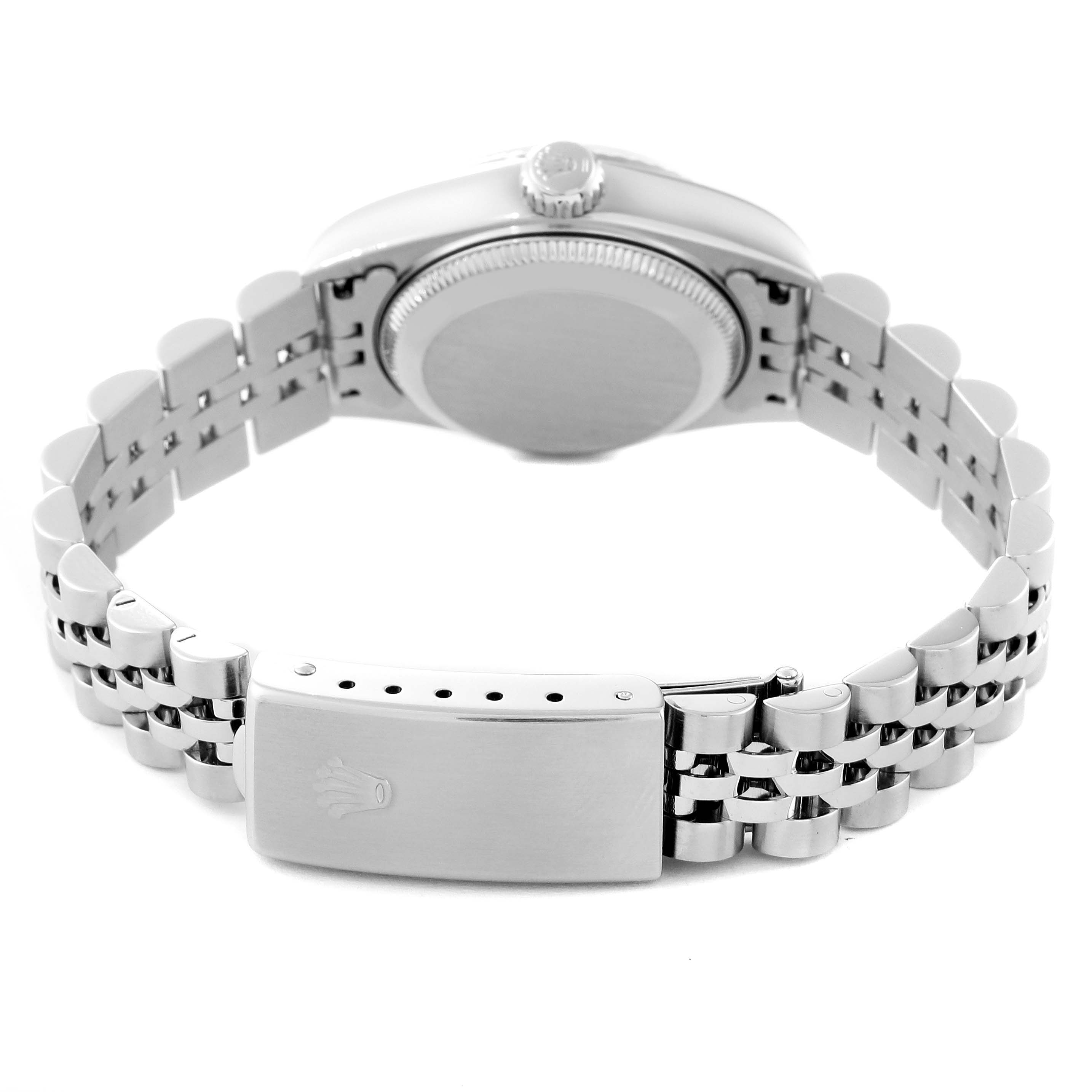 The image shows the rear view of a Rolex Datejust 79174 Women's Stainless Steel White Dial 79174 Women's Stainless Steel White Dial watch focusing on the case back and Jubilee bracelet with the clasp.