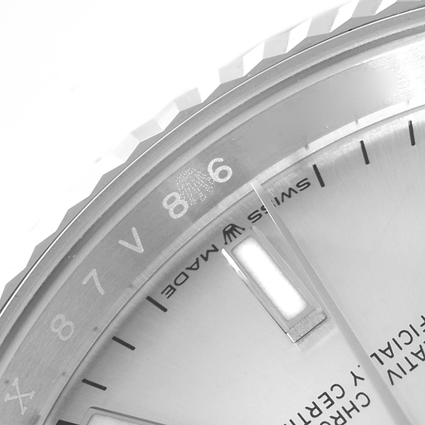 This image shows a close-up of the dial and bezel of a Rolex Datejust 126234 Men's Stainless Steel Silver Dial 126234 Men's Stainless Steel Silver Dial watch, highlighting the inscription and markers.