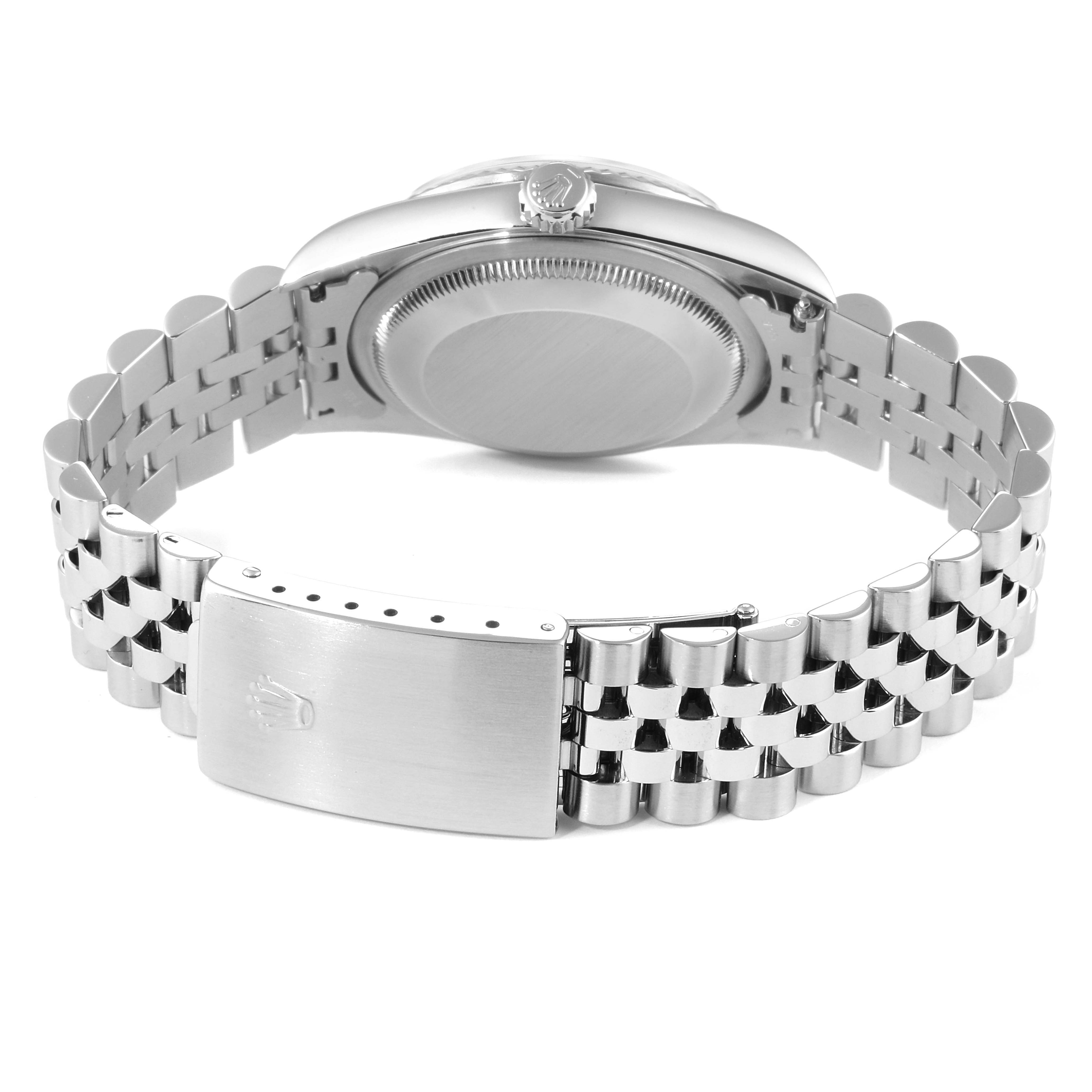 The Rolex Datejust 16234 Men's Stainless Steel Silver Dial 16234 Men's Stainless Steel Silver Dial watch is shown from the back, displaying its case and bracelet, including the clasp.