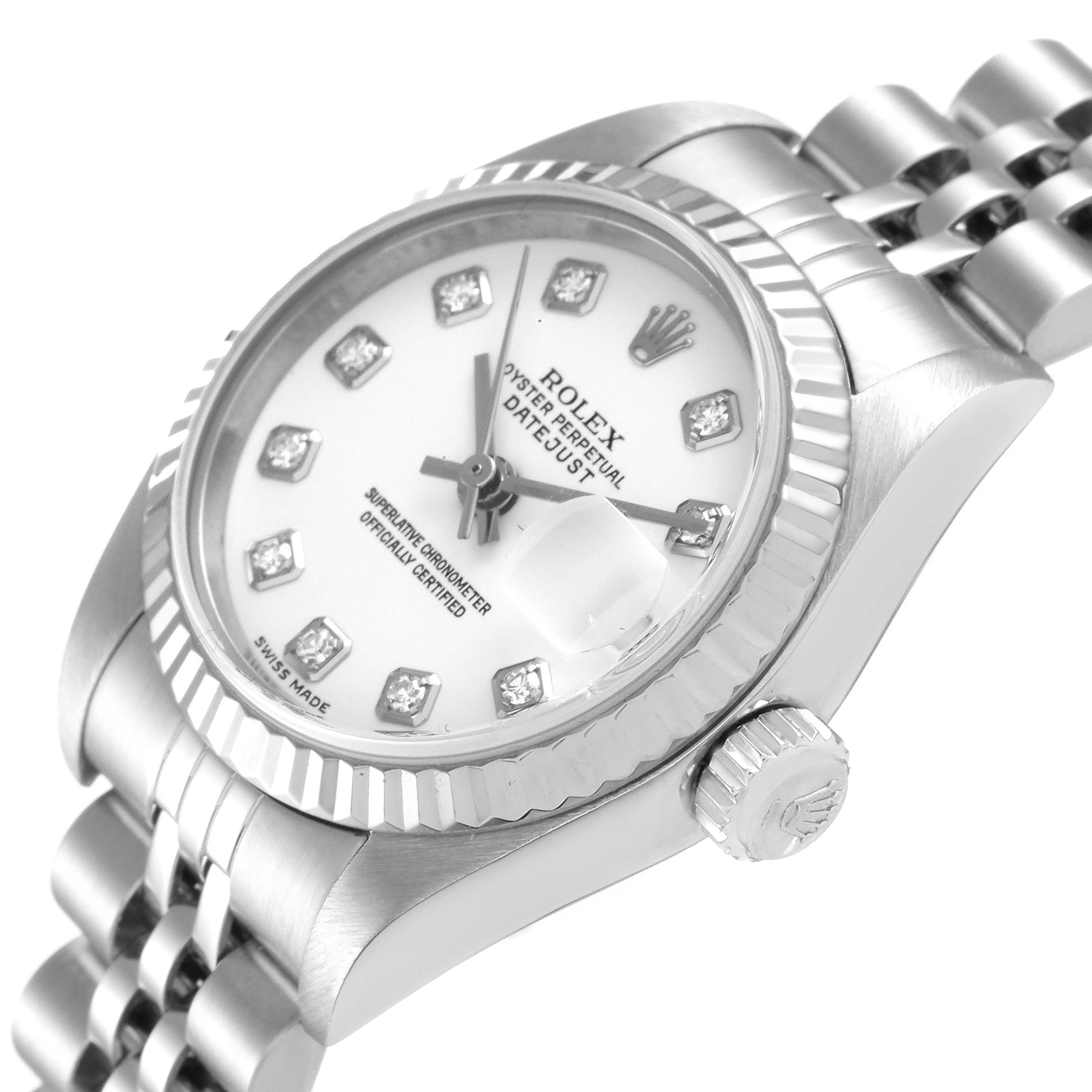 The image shows a close-up angle of a Rolex Datejust 79174 Women
s Stainless Steel White Dial 79174 Women
s Stainless Steel White Dial watch, highlighting its crown, bezel, dial, and part of the bracelet.