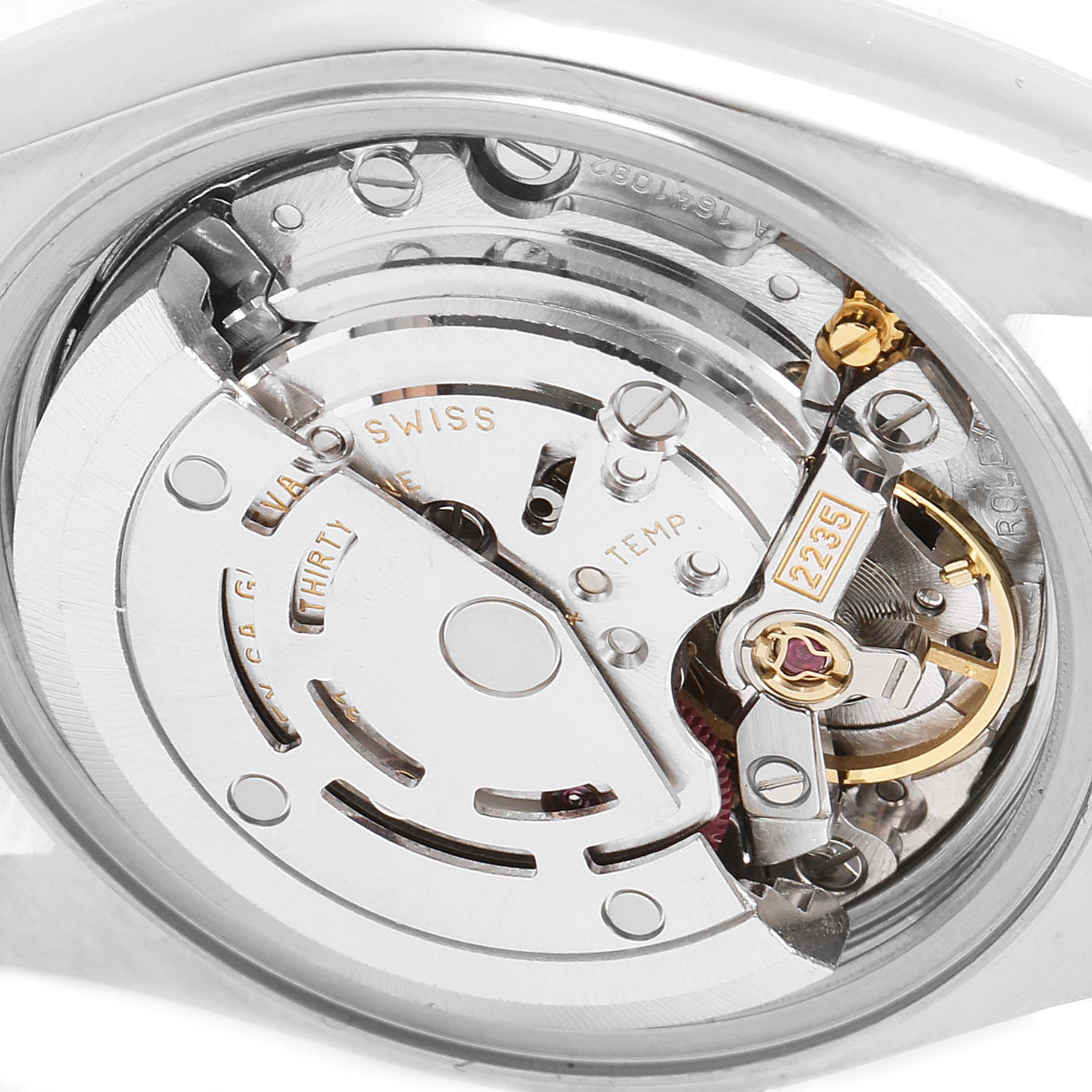 The image shows the inner mechanical movement of a Rolex Datejust 79174 Women
s Stainless Steel White Dial 79174 Women
s Stainless Steel White Dial watch from a close-up, rear angle.