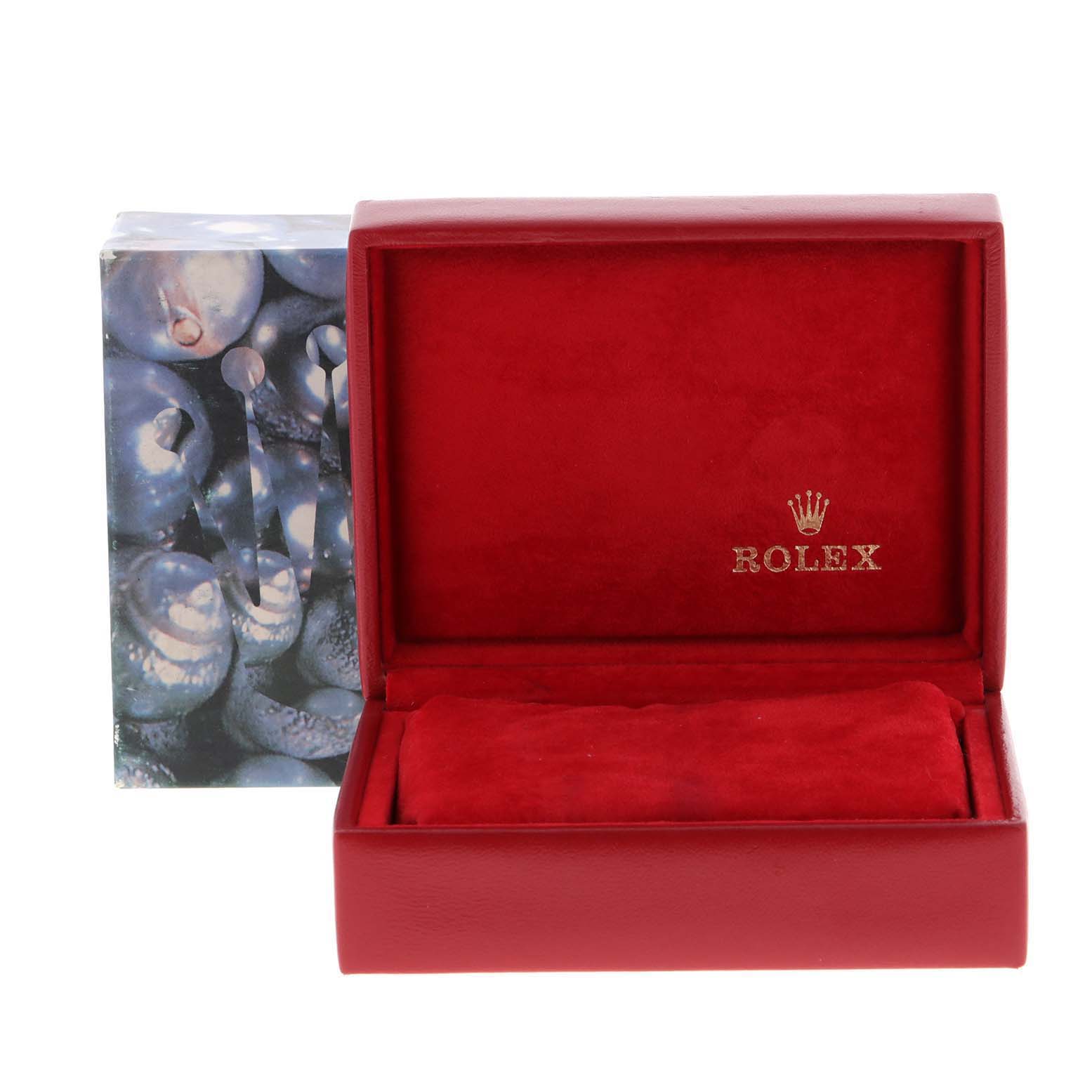 The image shows an open red Rolex Datejust 79174 Women
s Stainless Steel White Dial 79174 Women
s Stainless Steel White Dial watch box displaying the brand logo inside.