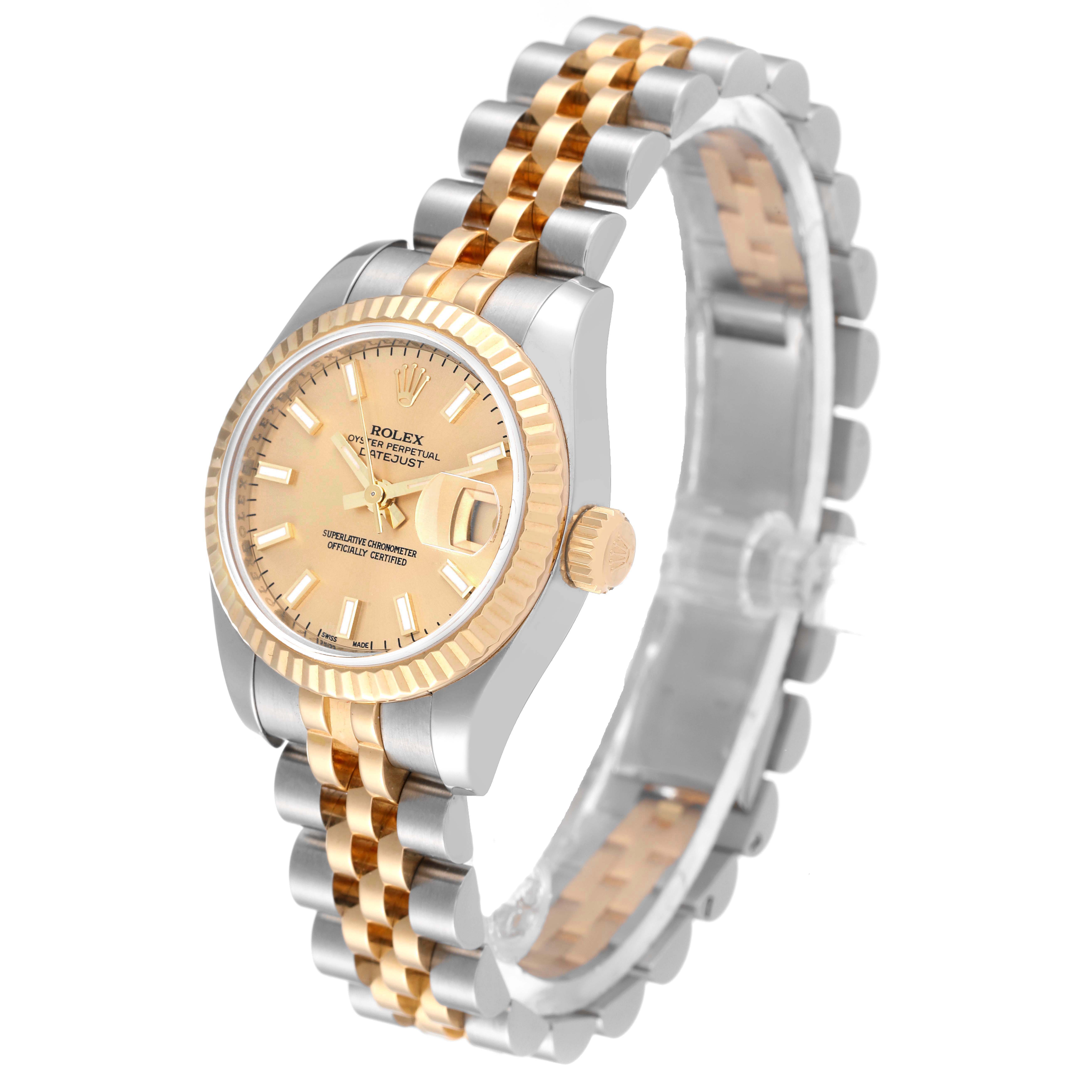 This image shows a Rolex Datejust 179173 Women's Steel and Gold (two tone) Champagne Dial 179173 Women's Steel and Gold (two tone) Champagne Dial watch at a three-quarter angle, highlighting the face, bezel, crown, and bracelet.