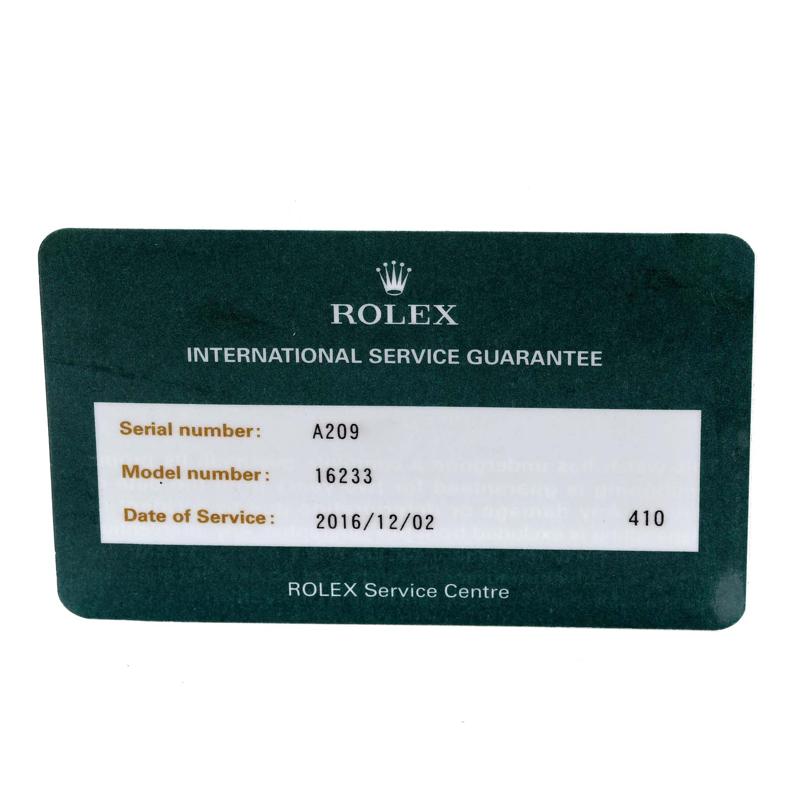 This image shows an International Service Guarantee card for a Rolex Datejust 16233 Men's Steel and Gold (two tone) Champagne Dial 16233 Men's Steel and Gold (two tone) Champagne Dial model 16233.