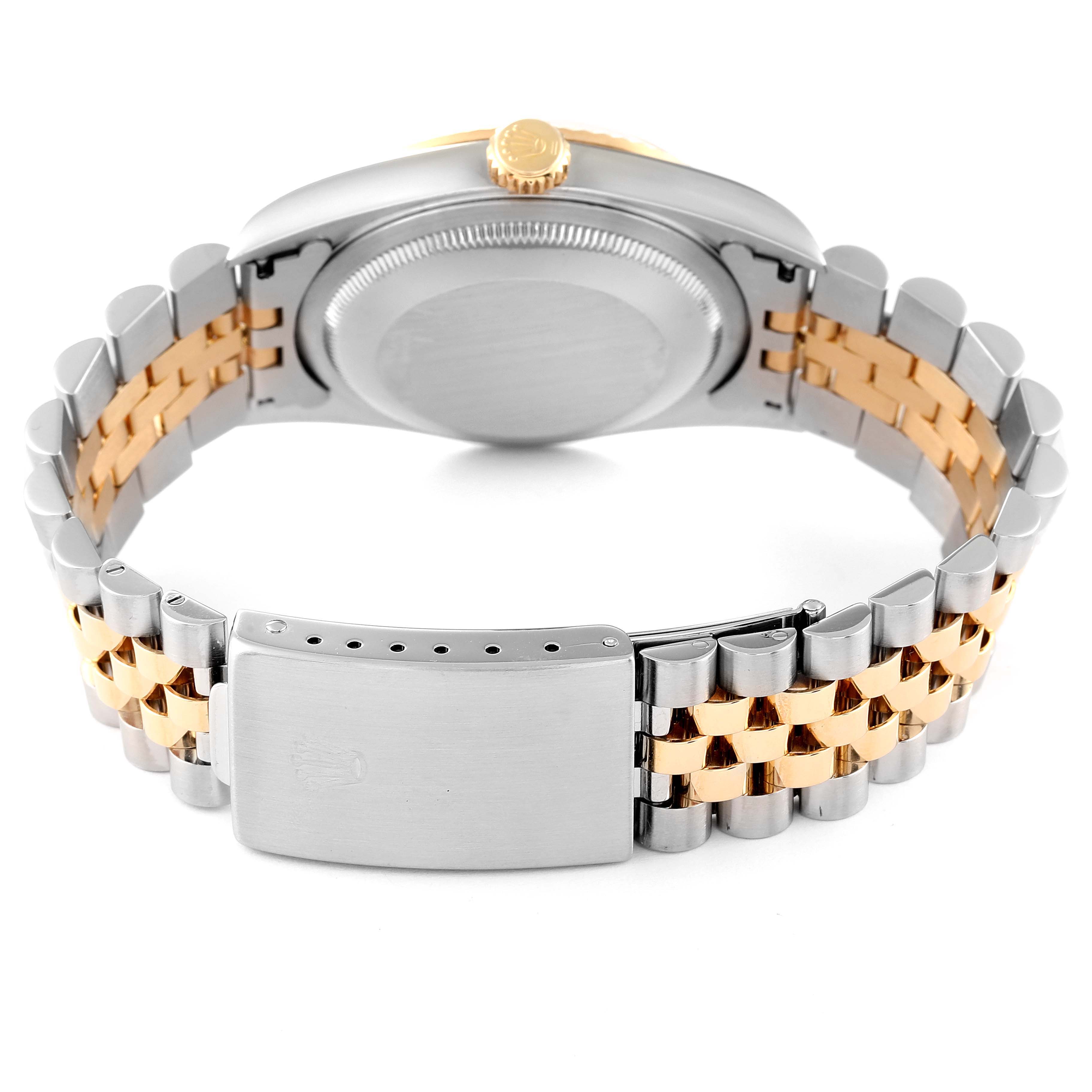 This image shows the back and side of the Rolex Datejust 16233 Men's Steel and Gold (two tone) Champagne Dial 16233 Men's Steel and Gold (two tone) Champagne Dial watch, focusing on its two-tone bracelet and clasp.