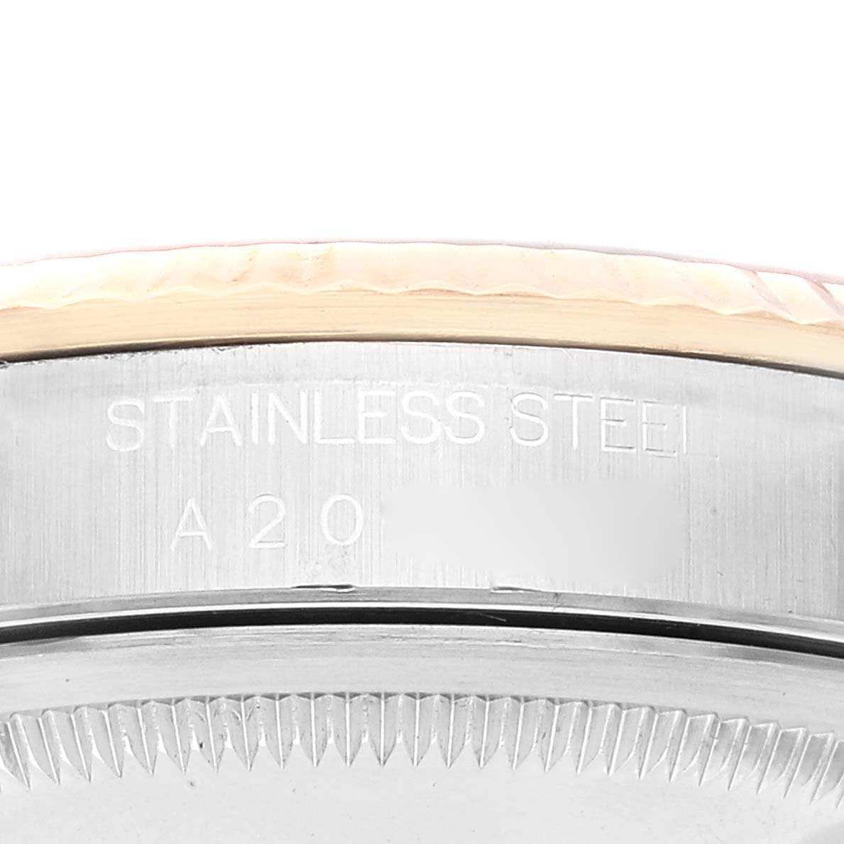 This image shows a close-up view of the side and edge of the stainless steel case of a Rolex Datejust 16233 Men's Steel and Gold (two tone) Champagne Dial 16233 Men's Steel and Gold (two tone) Champagne Dial watch.