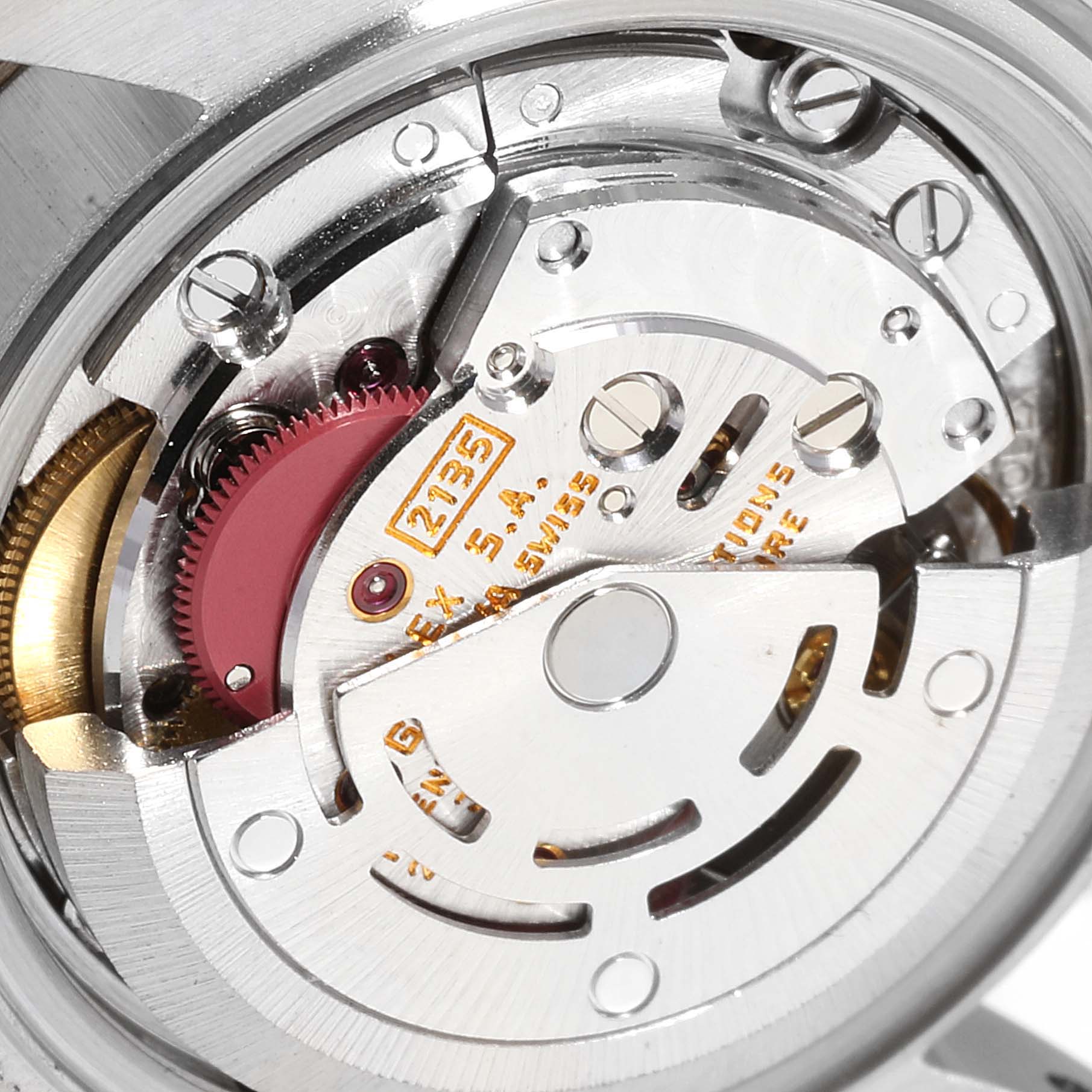 The image shows a close-up view of the movement mechanism of a Rolex Datejust 69173 Women
s Steel and Gold (two tone) Champagne Dial 69173 Women
s Steel and Gold (two tone) Champagne Dial watch.
