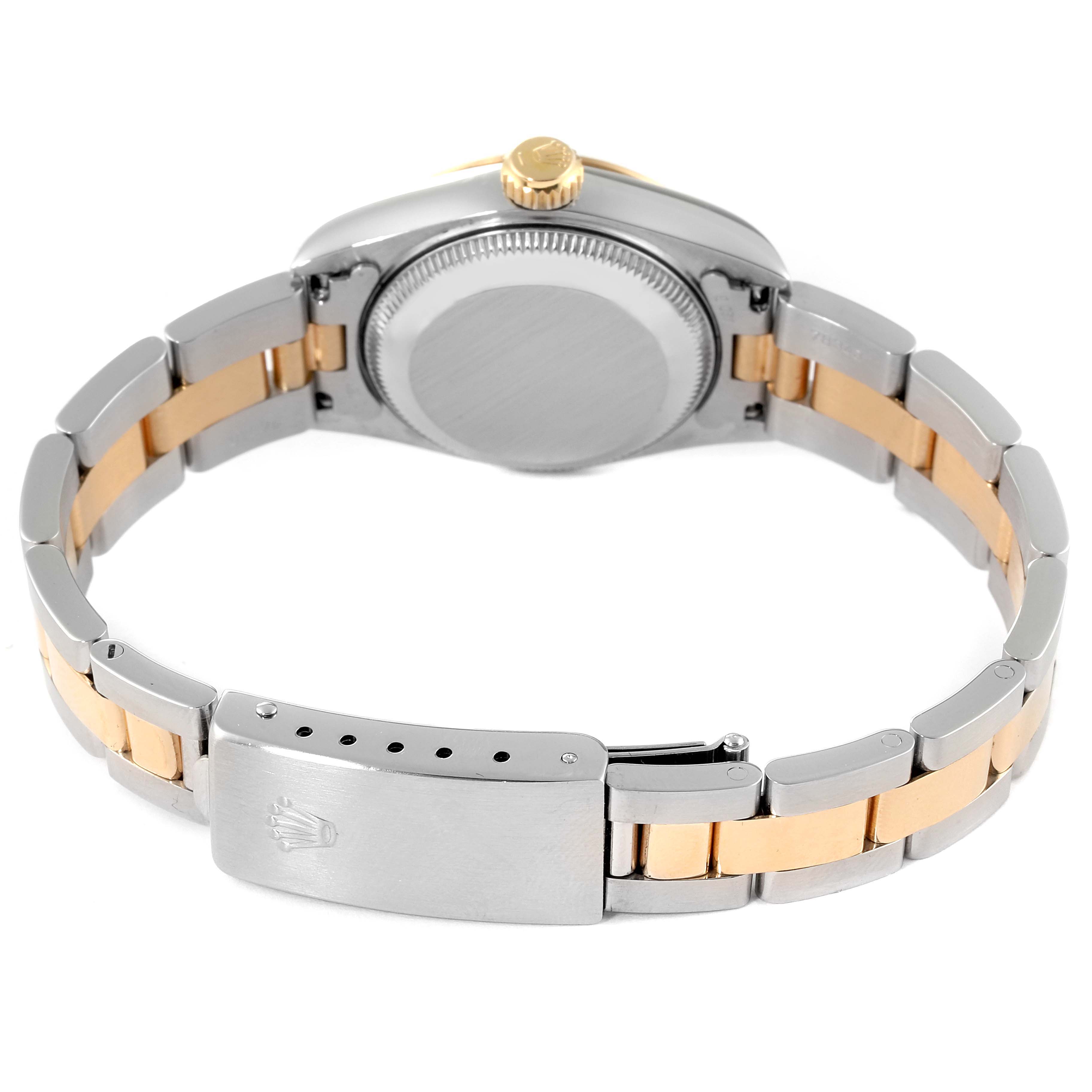 The image shows the back of a Rolex Datejust 69163 Women
s Steel and Gold (two tone) Mother of Pearl Dial 69163 Women
s Steel and Gold (two tone) Mother of Pearl Dial watch with a two-tone bracelet, crown, and clasp featuring the Rolex logo.