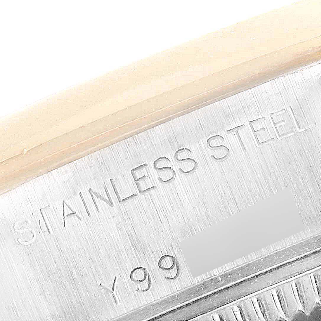 This image shows a close-up angle of the side of a stainless steel Rolex Datejust 79163 Women
s Steel and Gold (two tone) Mother of Pearl Dial 79163 Women
s Steel and Gold (two tone) Mother of Pearl Dial model watch case.