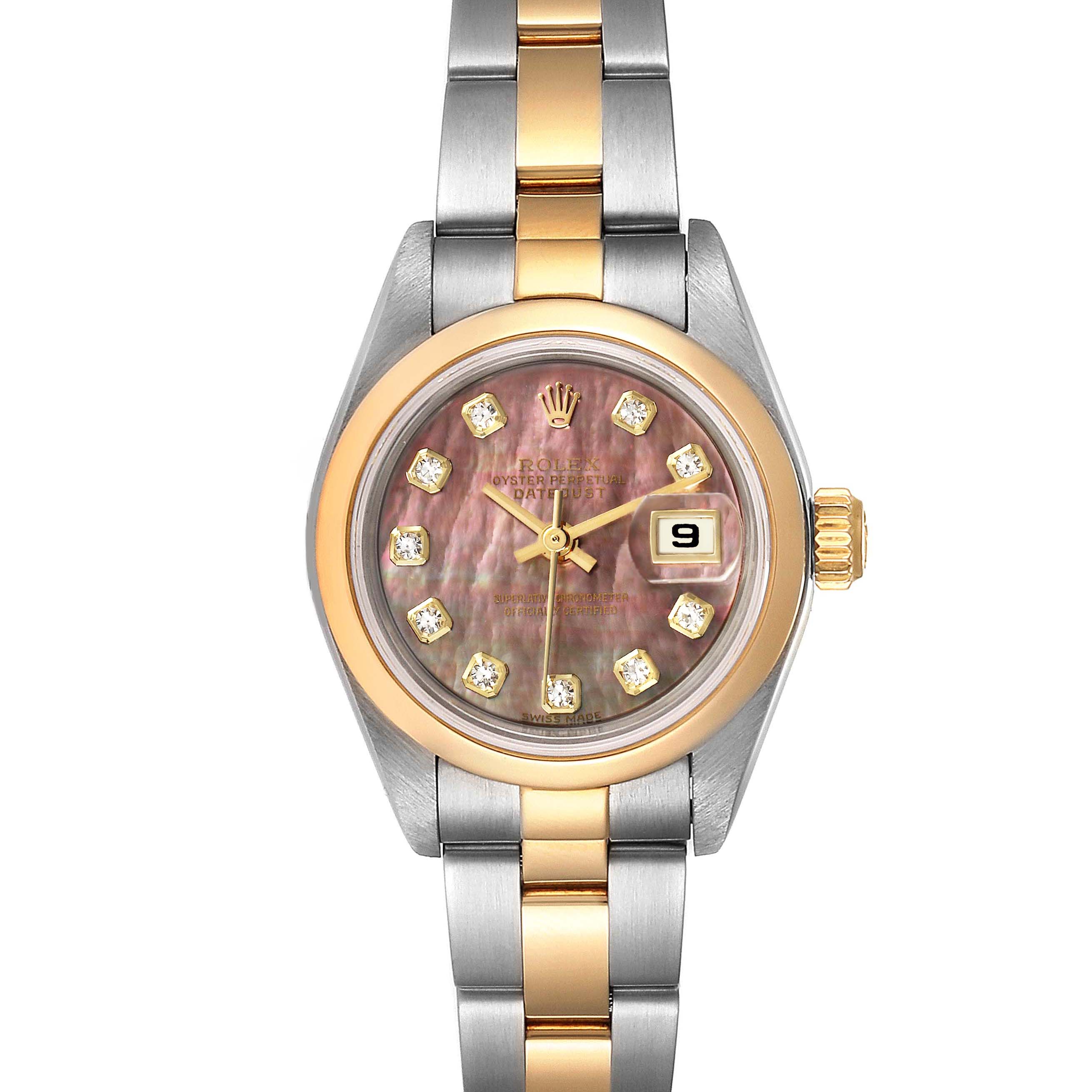 The image shows a front view of the Rolex Datejust 79163 Women
s Steel and Gold (two tone) Mother of Pearl Dial 79163 Women
s Steel and Gold (two tone) Mother of Pearl Dial watch, featuring a two-tone bracelet and diamond dial.