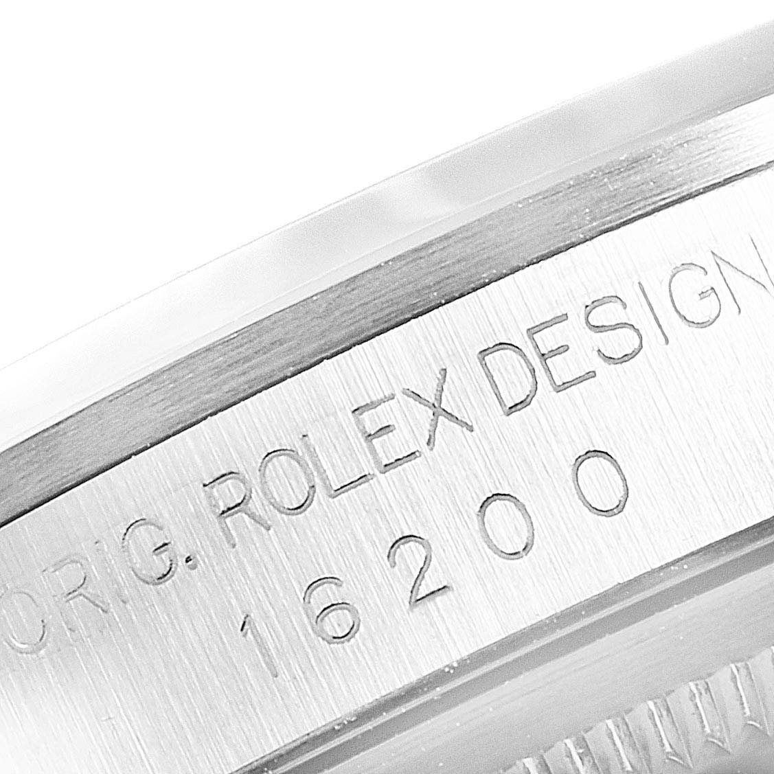 This close-up image shows the engraved serial number and design details on the side of a Rolex Datejust 16200 Men's Stainless Steel White Dial 16200 Men's Stainless Steel White Dial watch.