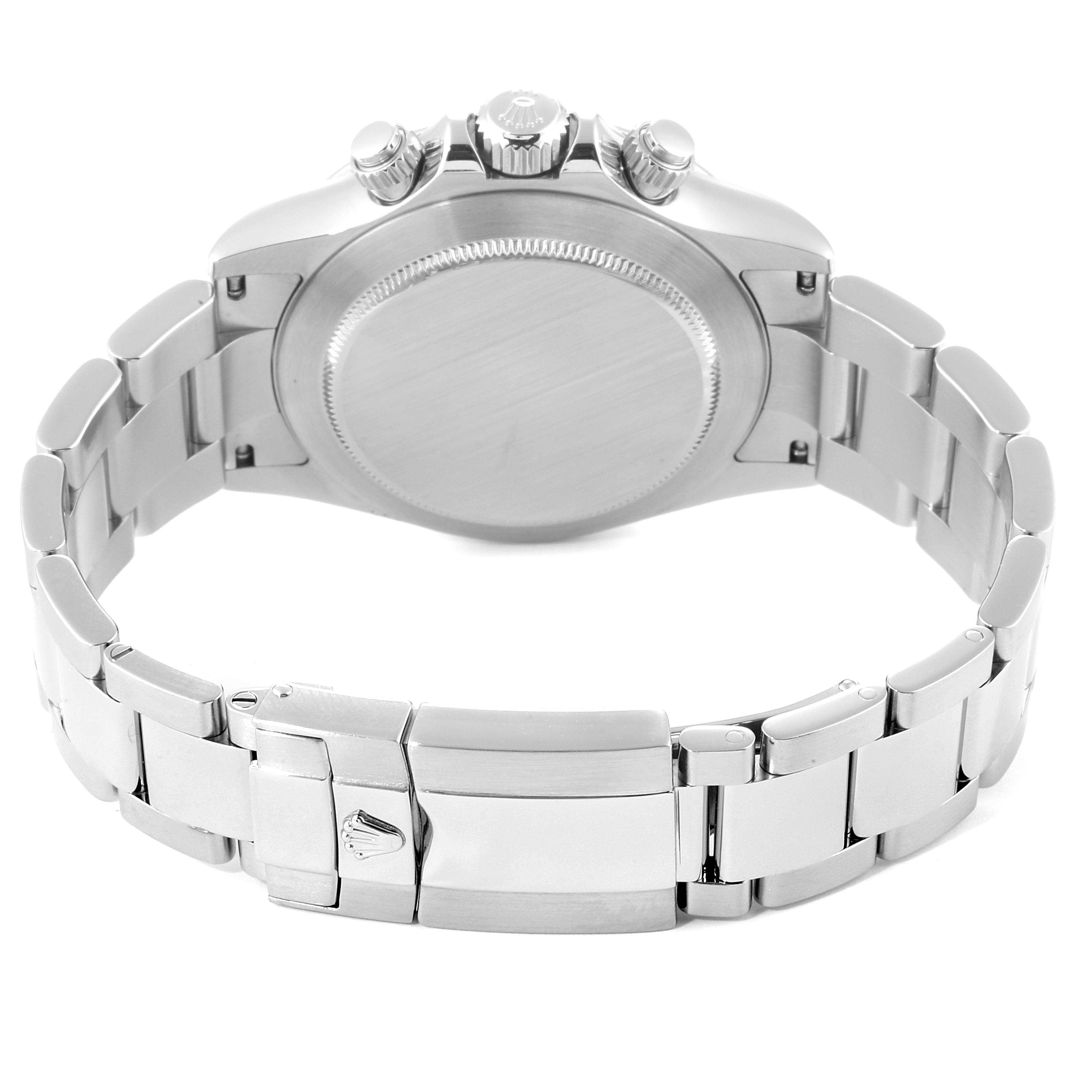 This image shows the back case, crown, pushers, and bracelet of a Rolex Daytona 116520 Men's Stainless Steel Black Dial 116520 Men's Stainless Steel Black Dial watch from a rear angle.