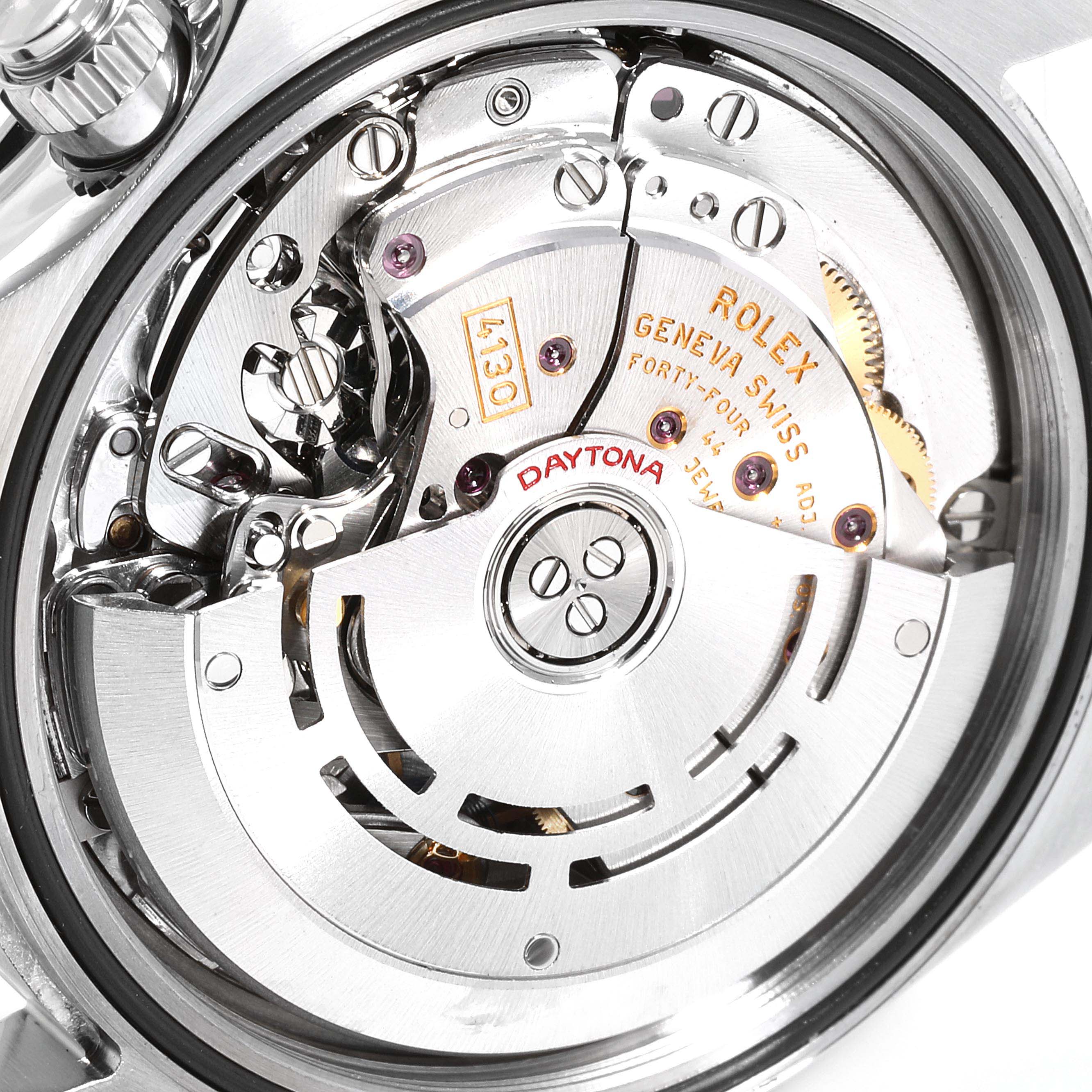 This image shows a close-up of the movement parts of a Rolex Daytona 116520 Men's Stainless Steel Black Dial 116520 Men's Stainless Steel Black Dial model, highlighting the intricate mechanical components.