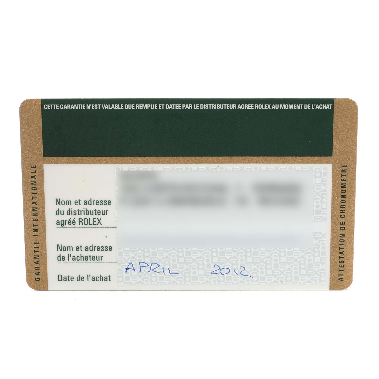 This image shows the front side of an official Rolex Daytona 116523 Men's Steel and Gold (two tone) Black Dial 116523 Men's Steel and Gold (two tone) Black Dial warranty card with some details blurred out.