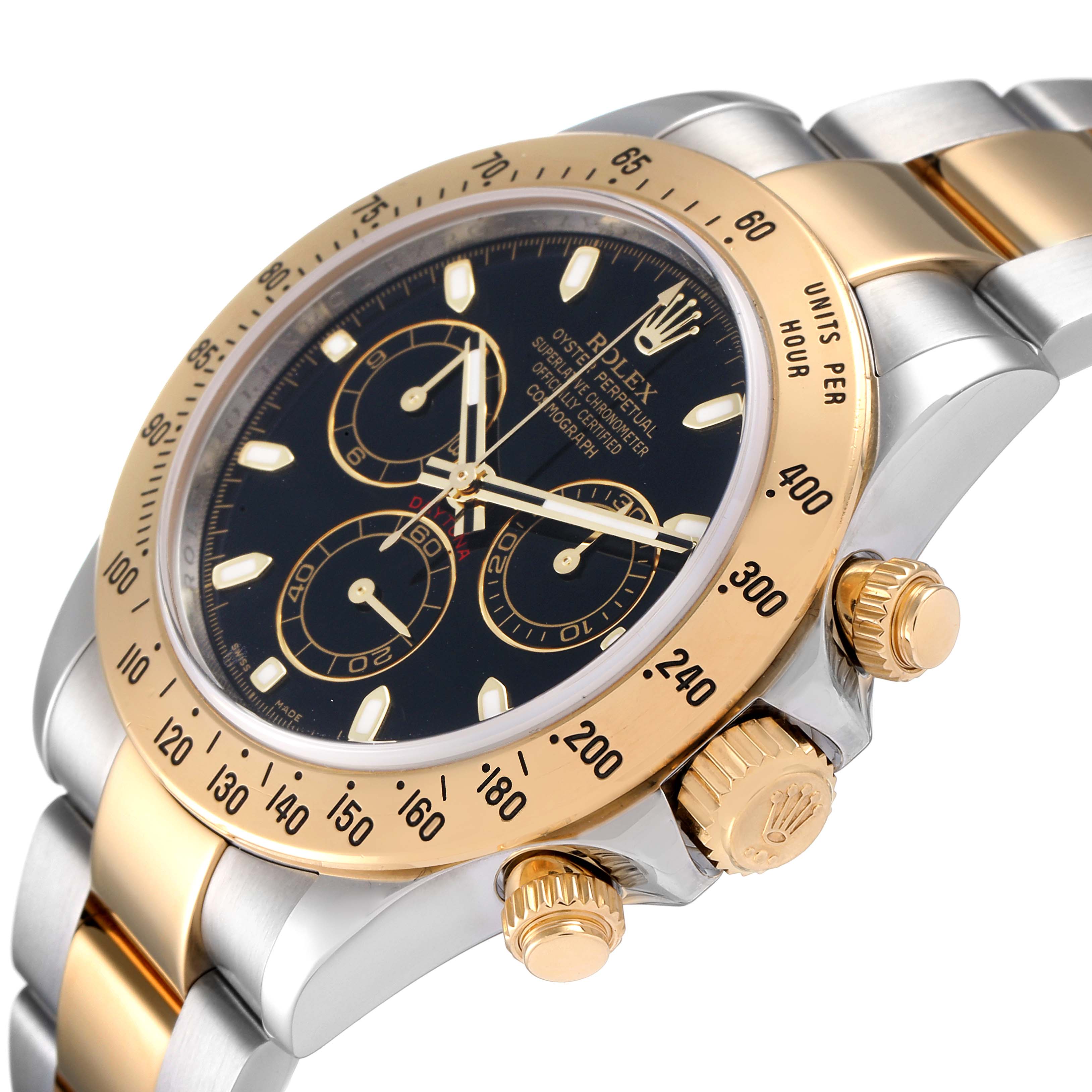 The image shows a close-up side angle of the Rolex Daytona 116523 Men's Steel and Gold (two tone) Black Dial 116523 Men's Steel and Gold (two tone) Black Dial watch, highlighting its bezel, crown, pushers, and bracelet.