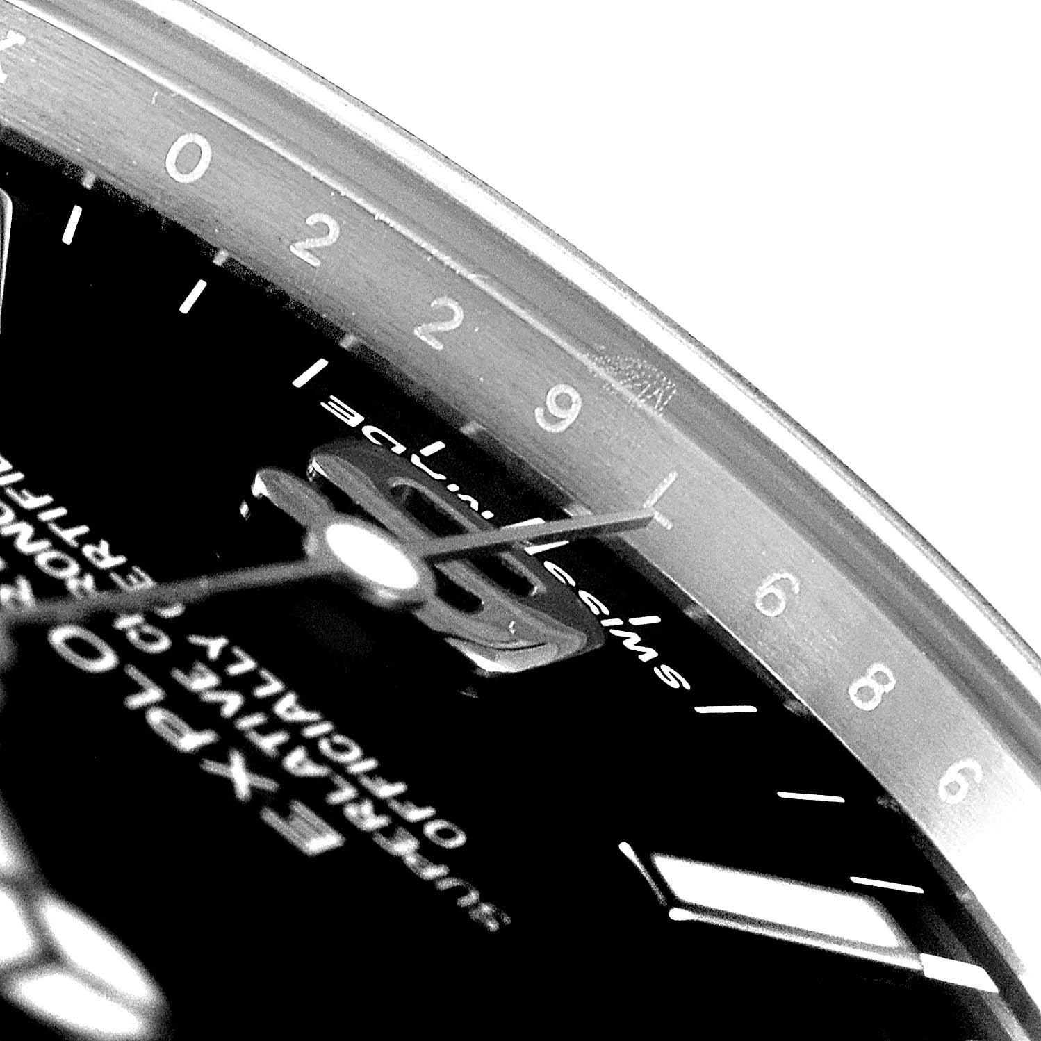 The image shows a close-up of the dial and hands of the Rolex Explorer 214270 Men
s Stainless Steel Black Dial 214270 Men
s Stainless Steel Black Dial, capturing the 1 to 9 numerical markers.