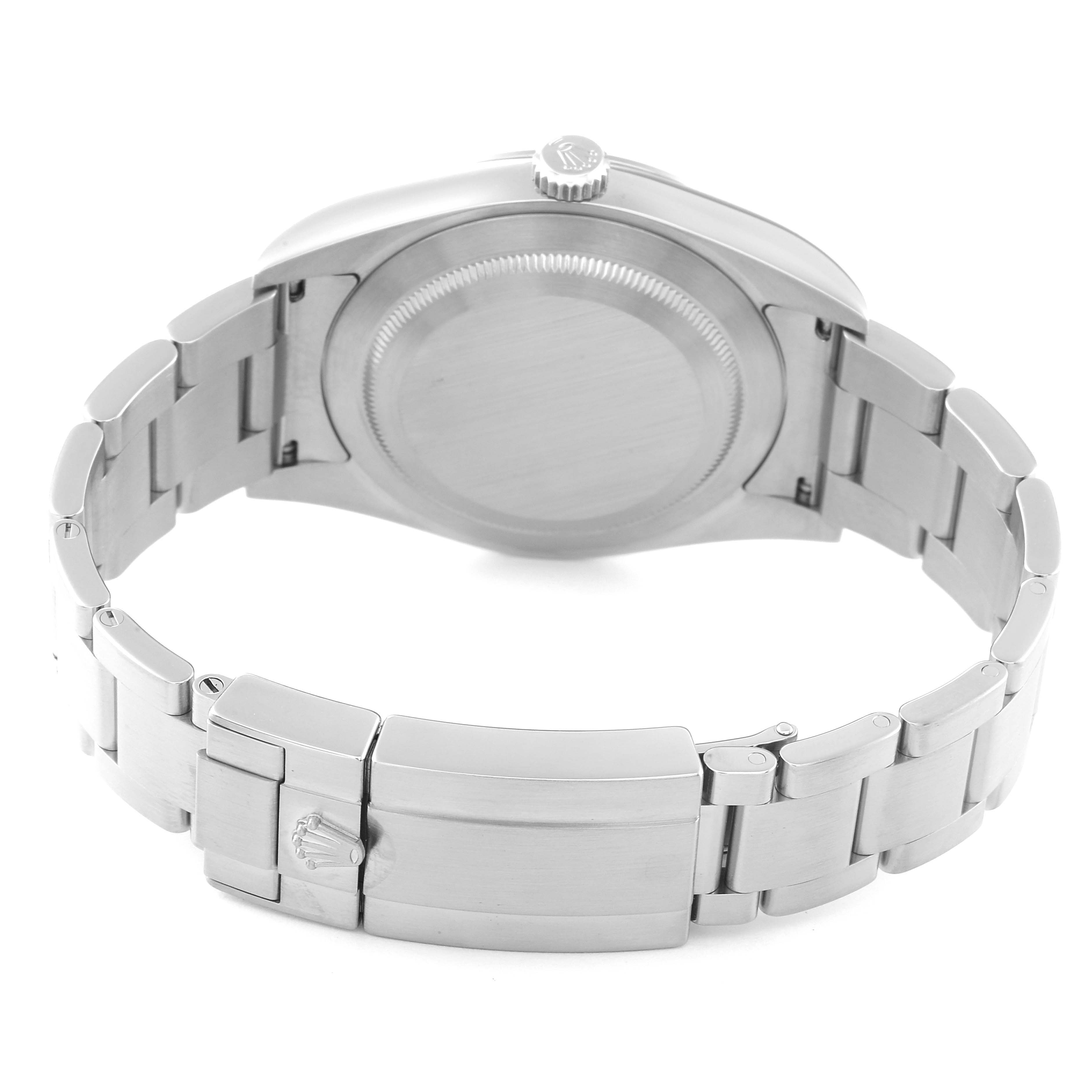 This image shows the backside and clasp of a Rolex Explorer 214270 Men's Stainless Steel Black Dial 214270 Men's Stainless Steel Black Dial watch, highlighting the metal bracelet and the closed case back.