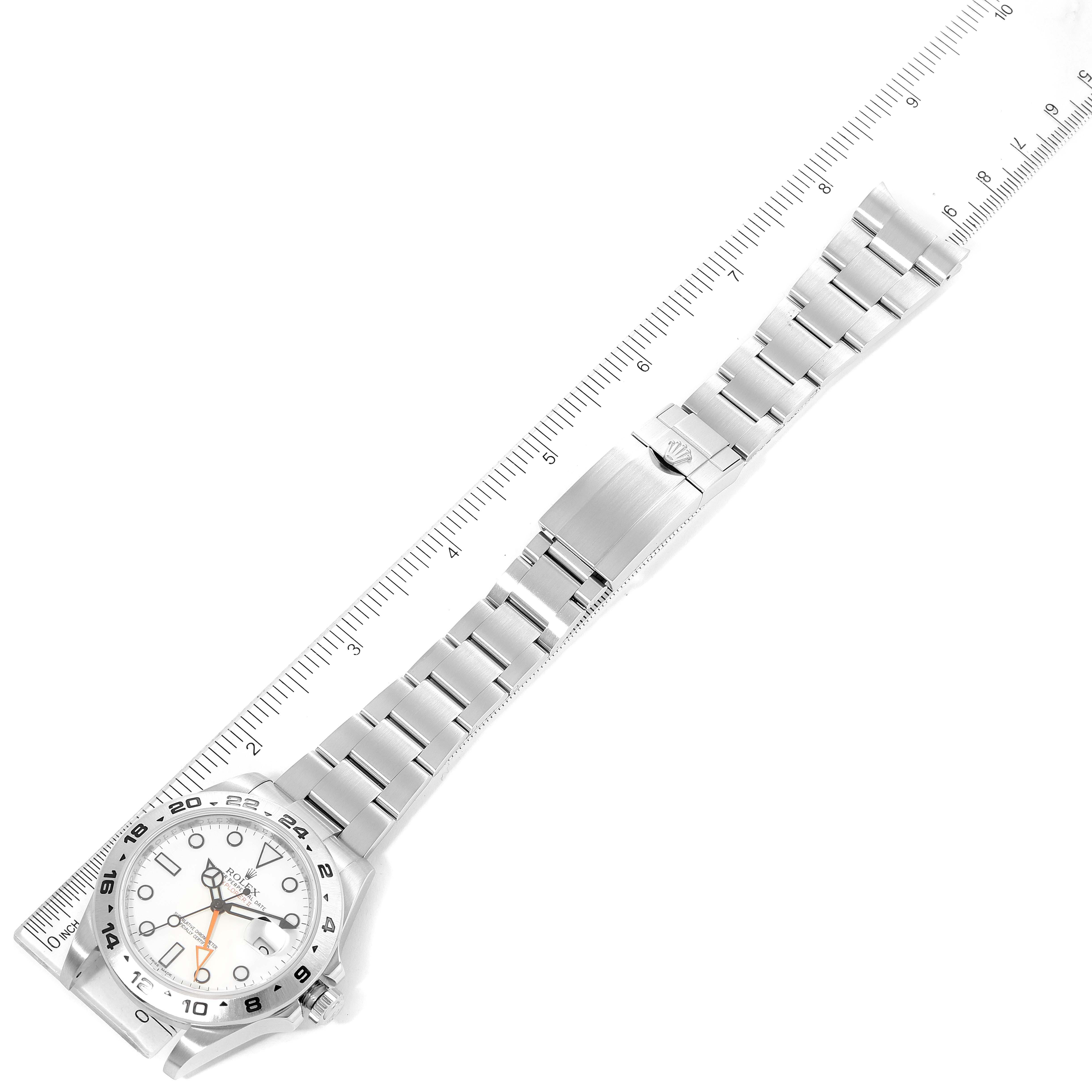 The image shows a top-down view of a Rolex Explorer 216570 Men's Stainless Steel White Dial 216570 Men's Stainless Steel White Dial watch, including the face, bezel, and fully extended metal bracelet.