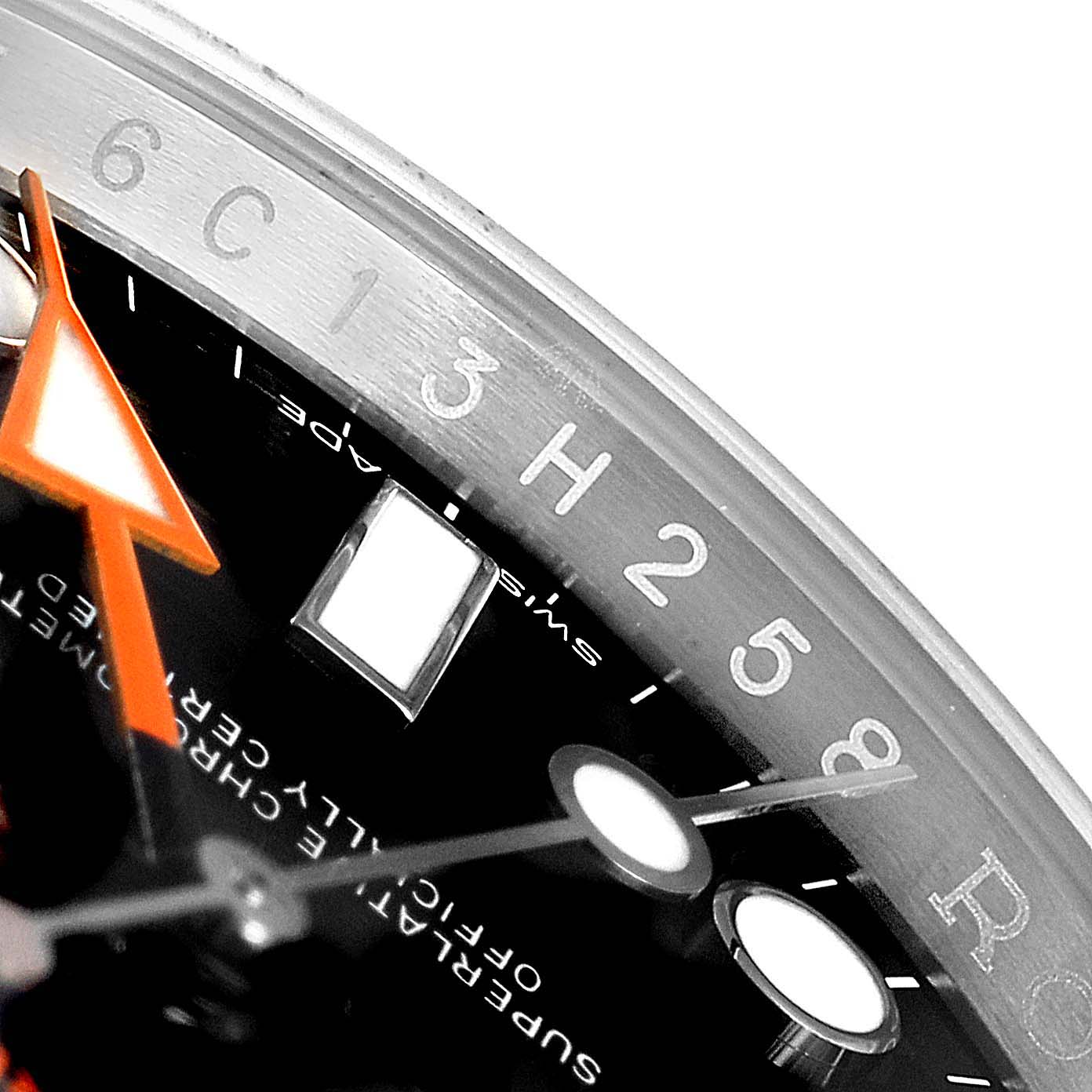 Close-up of a Rolex Explorer 216570 Men
s Stainless Steel Black Dial 216570 Men
s Stainless Steel Black Dial watch showing part of the dial, hour markers, and part of the bezel with numerals.