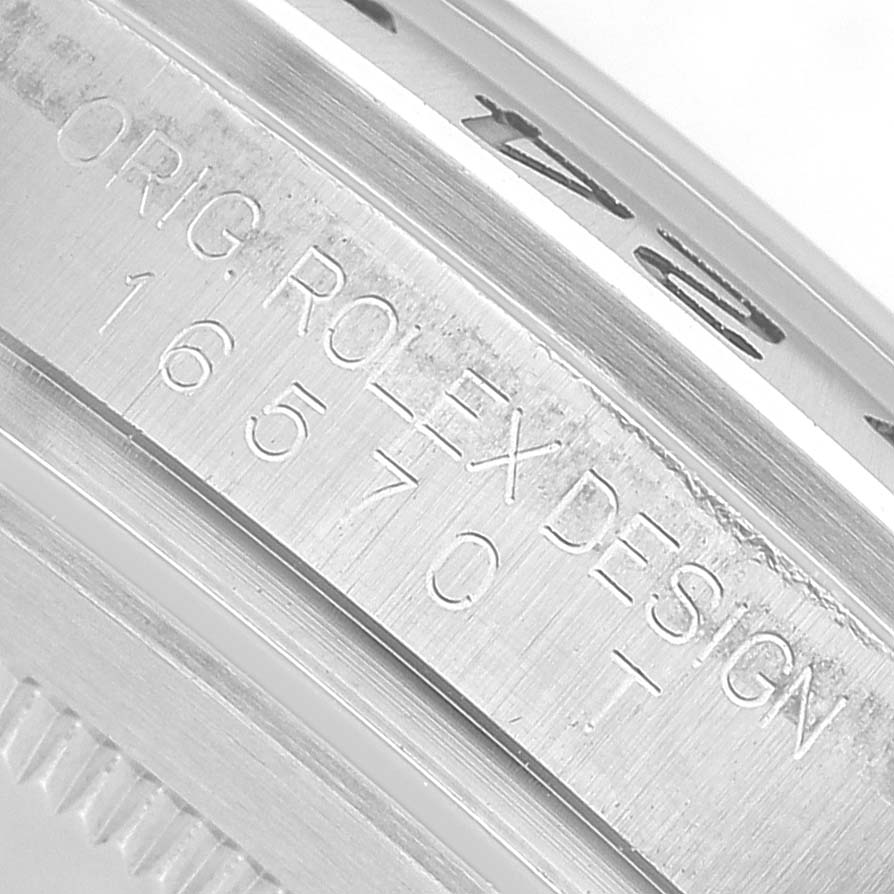The image shows a close-up of the case side of a Rolex Explorer 16570 T Men's Stainless Steel White Dial, focusing on the engraved model number.