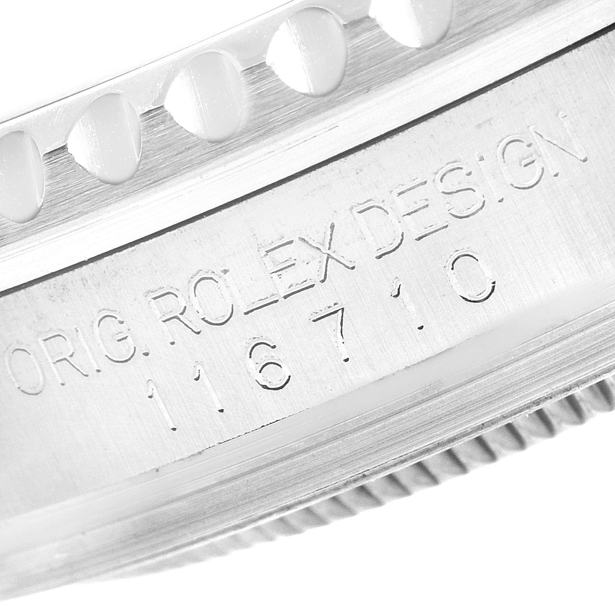 Close-up of the engraving on the side of the bezel of a Rolex GMT-Master 116710 Men
s Stainless Steel Black Dial 116710 Men
s Stainless Steel Black Dial watch.