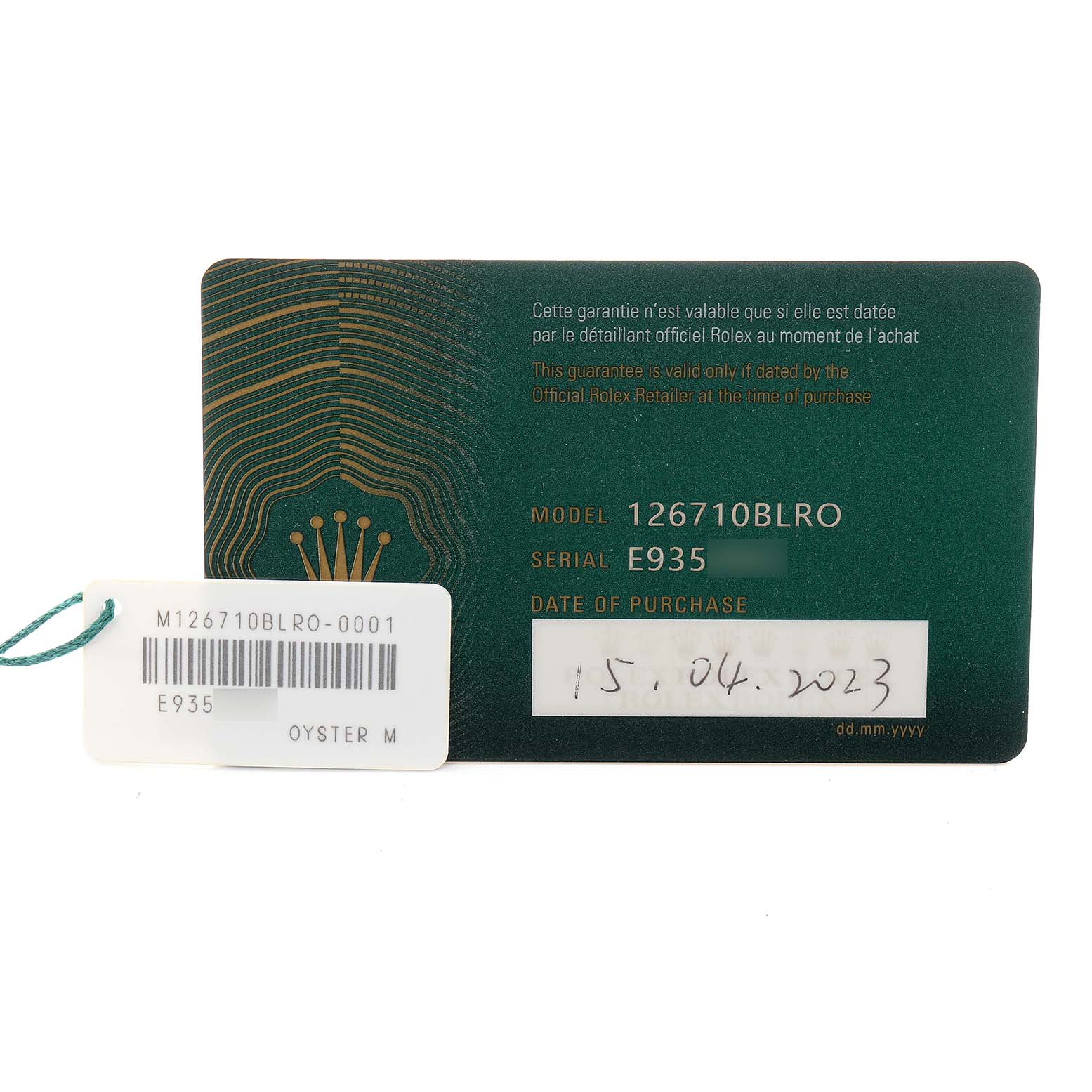 The image shows a warranty card and tag for a Rolex GMT-Master model 126710BLRO men's watch, featuring model and serial number details.