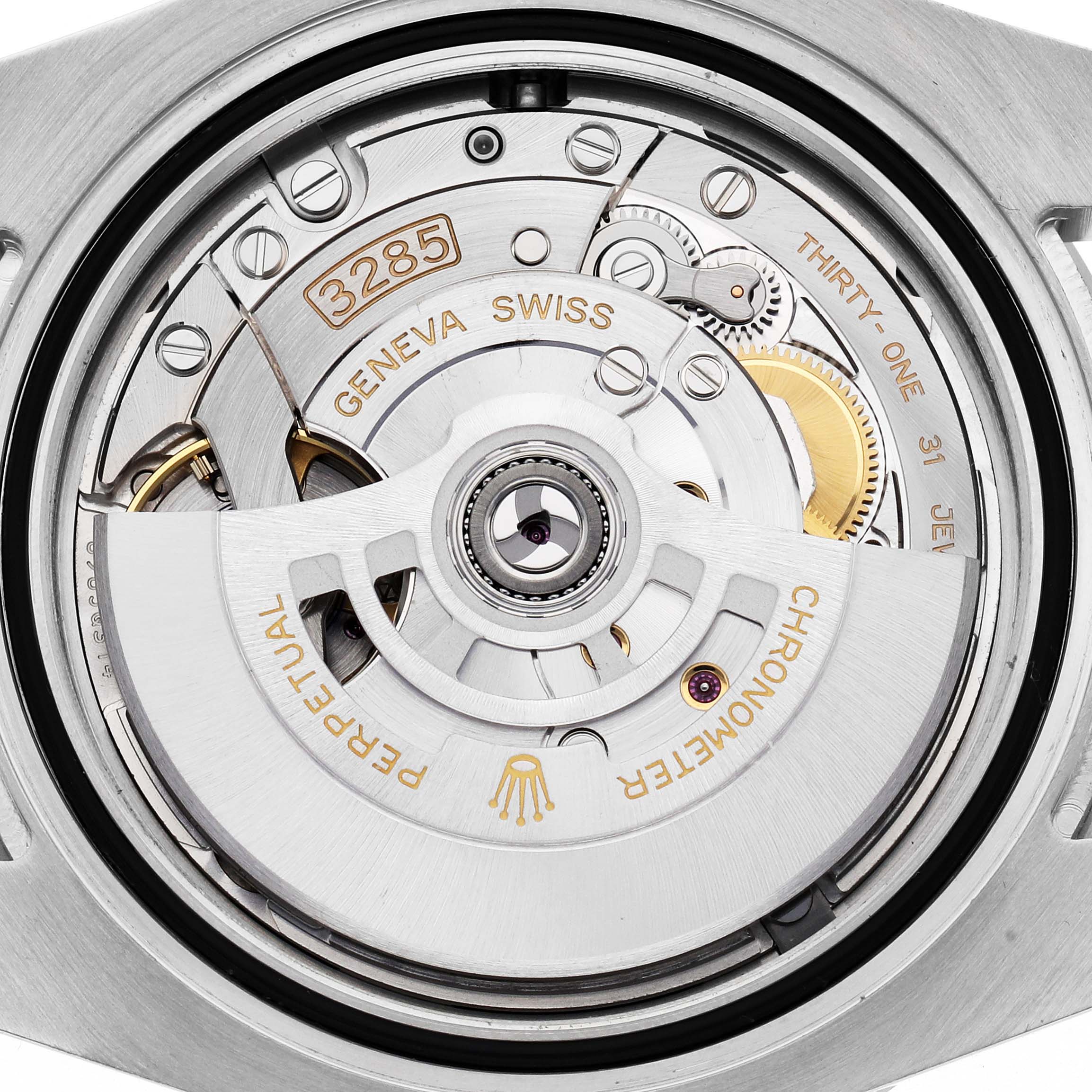 The image shows the Rolex GMT-Master 126710BLRO watch movement, viewed from the back, highlighting the intricate automatic mechanism and components.