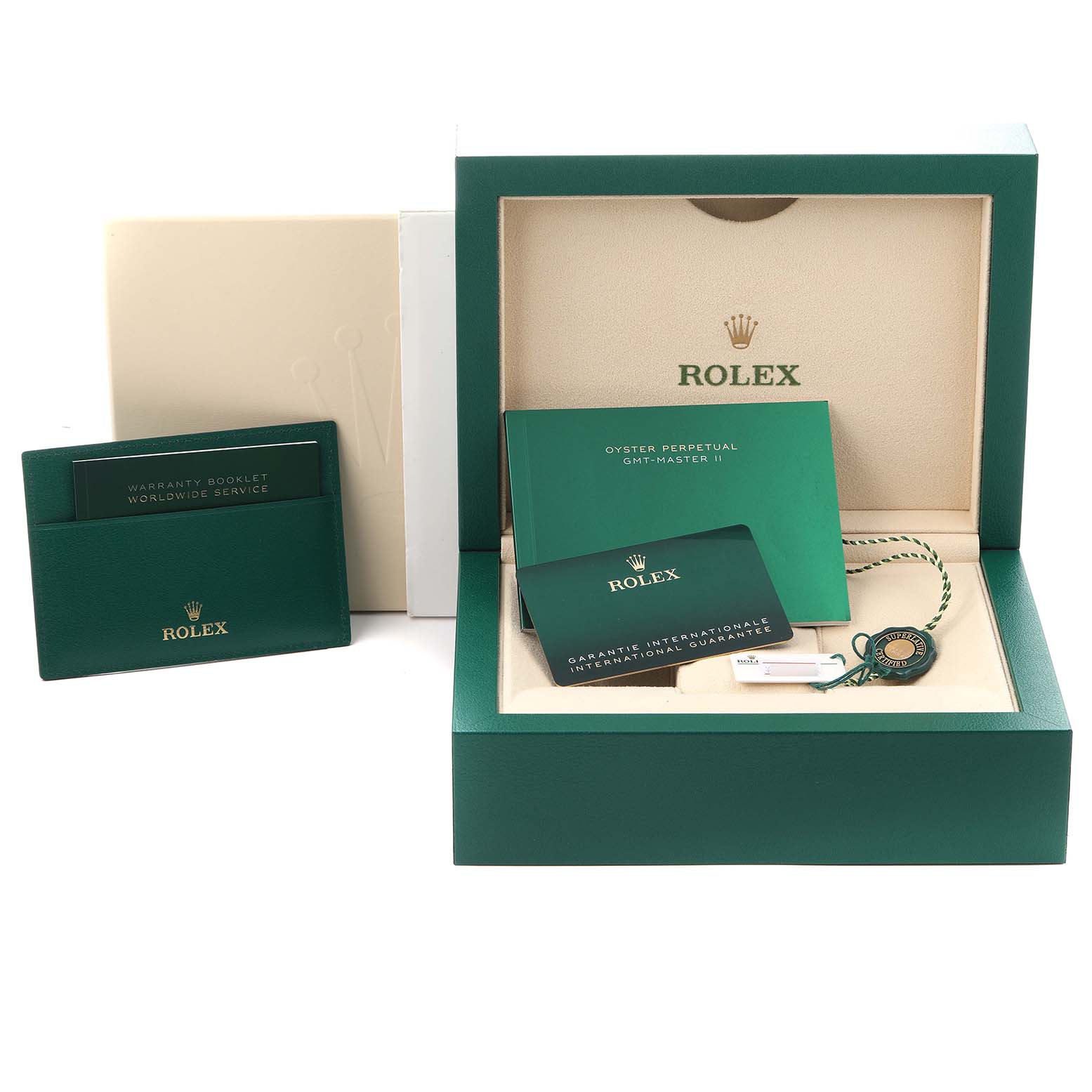The image shows the packaging and accessories for a Rolex GMT-Master model 126710BLRO, including booklets, a warranty card, and a presentation box.