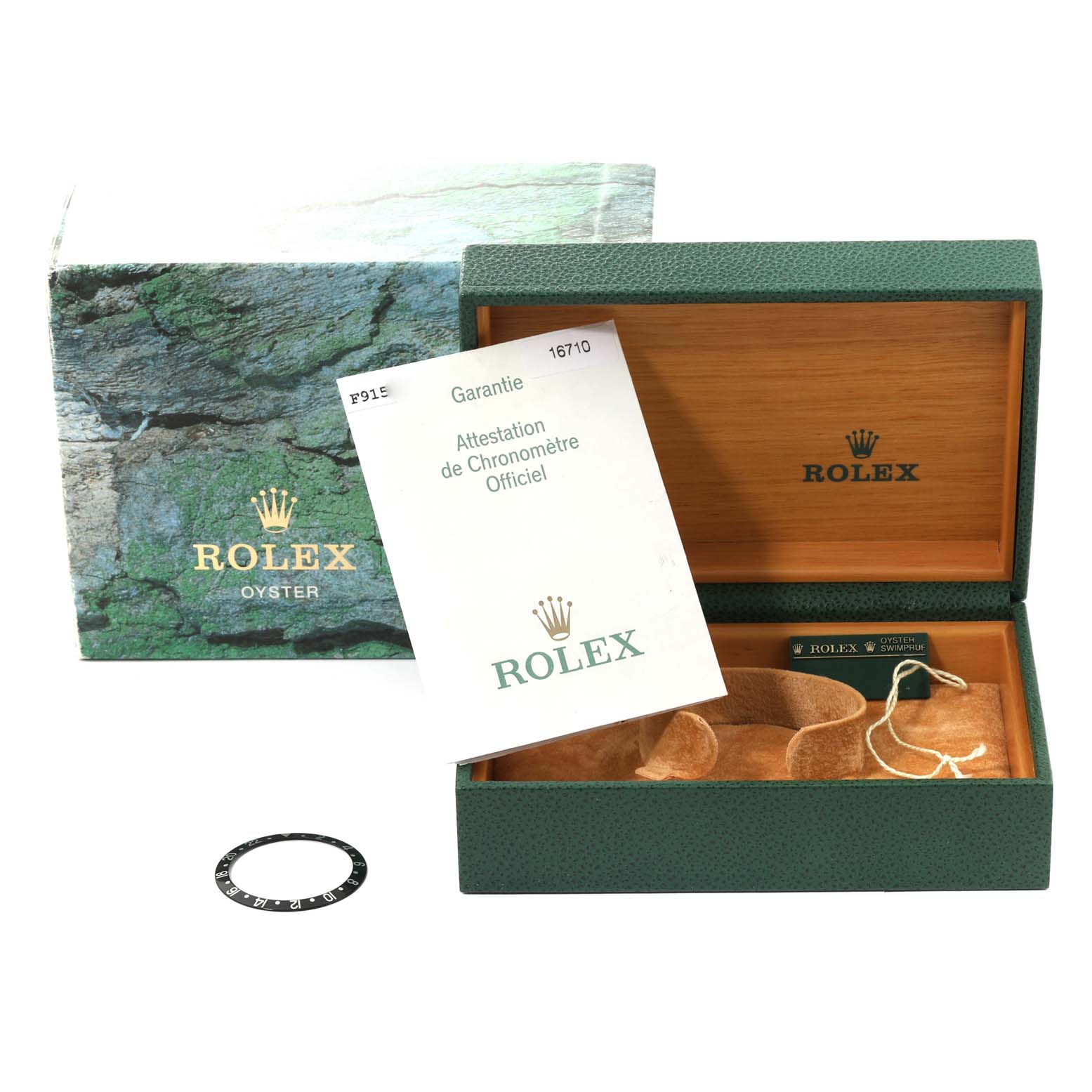 The image shows the box, warranty card, and bezel insert for a Rolex GMT-Master 16710 Men's Stainless Steel Black Dial 16710 Men's Stainless Steel Black Dial watch.