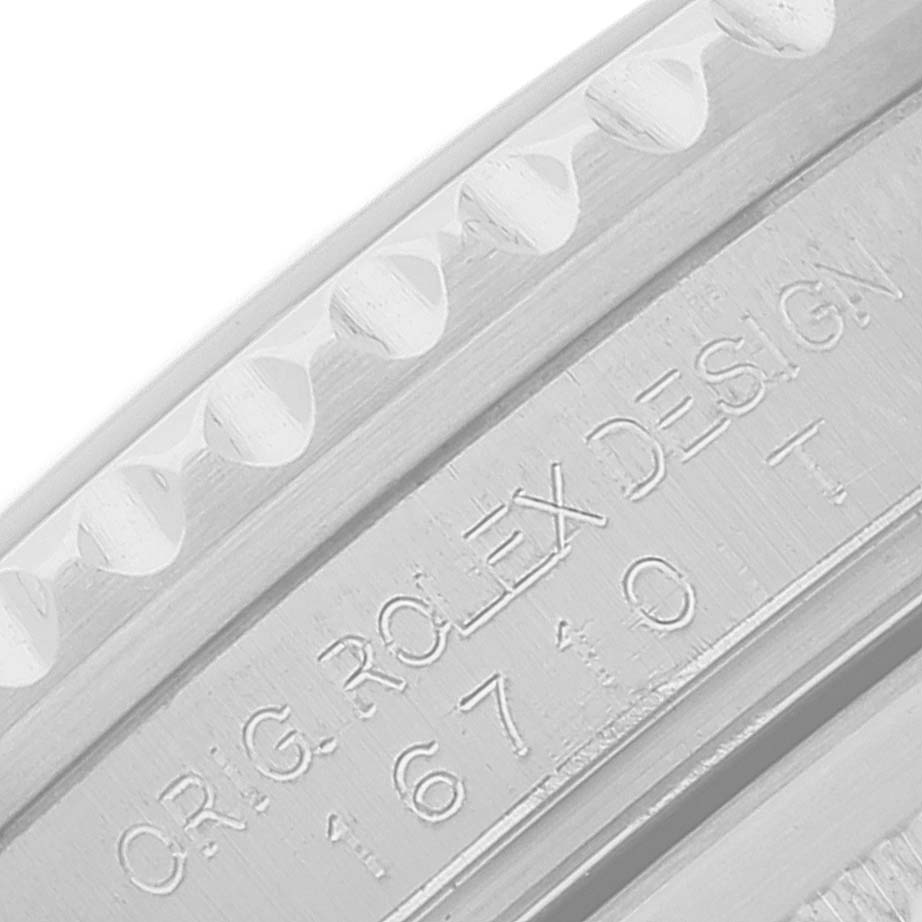 The image shows a close-up of the case number and design engraving on the side of a Rolex GMT-Master 16710 Men
s Stainless Steel Black Dial 16710 Men
s Stainless Steel Black Dial watch.