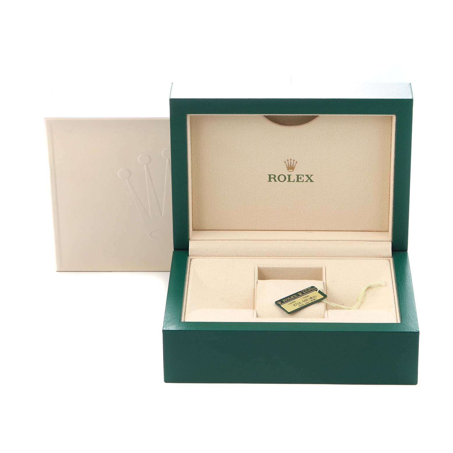 The image shows the open box of a Rolex Milgauss model 116400GV men's watch, featuring the branded interior and a tag, viewed from the front.