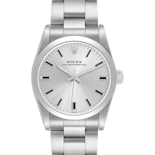 The Rolex Oyster Perpetual Mid-Size watch is shown from the front, displaying its dial, bracelet, and crown.