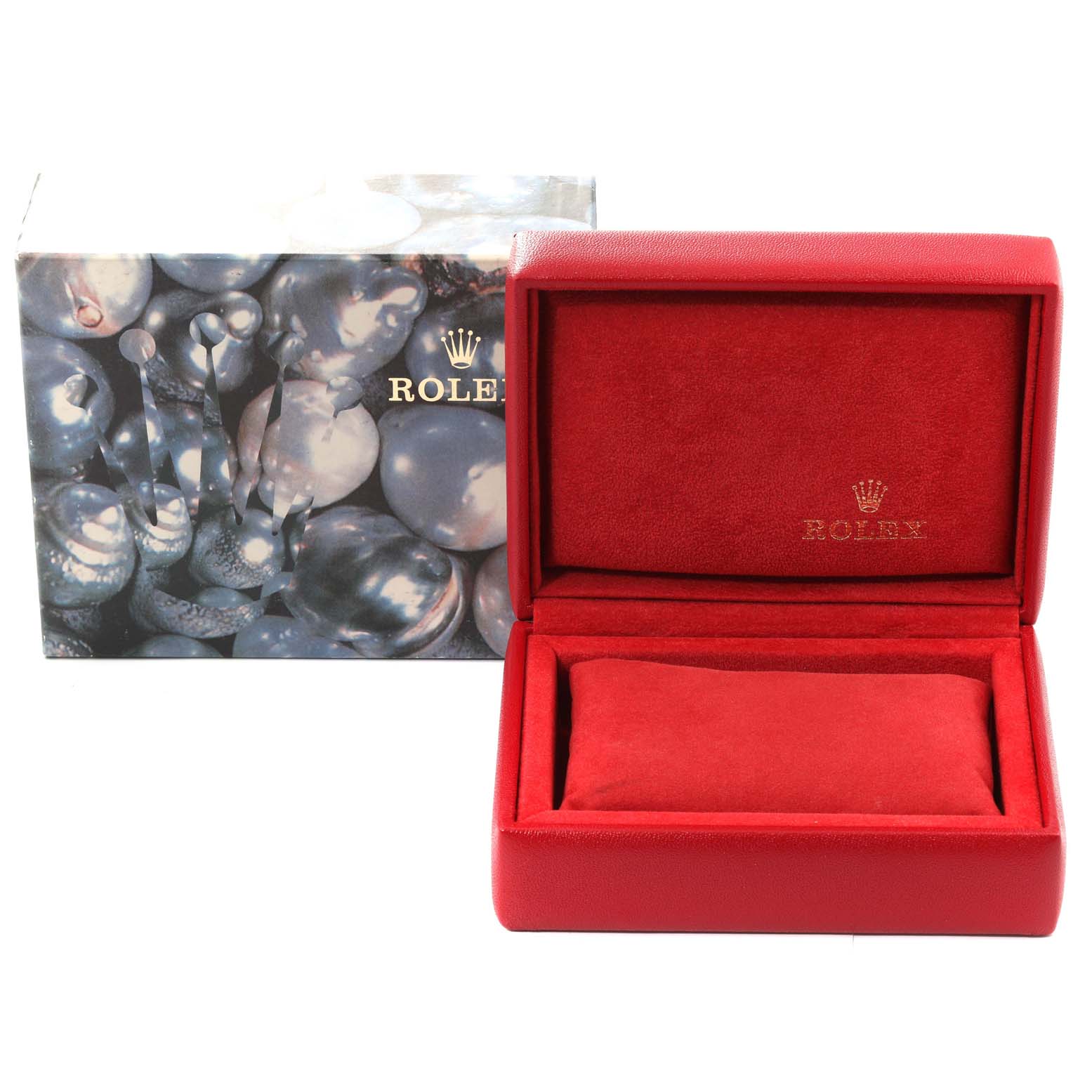 The image shows a red Rolex watch box and a decorative outer box with Rolex branding but no Oyster Perpetual watch visible.
