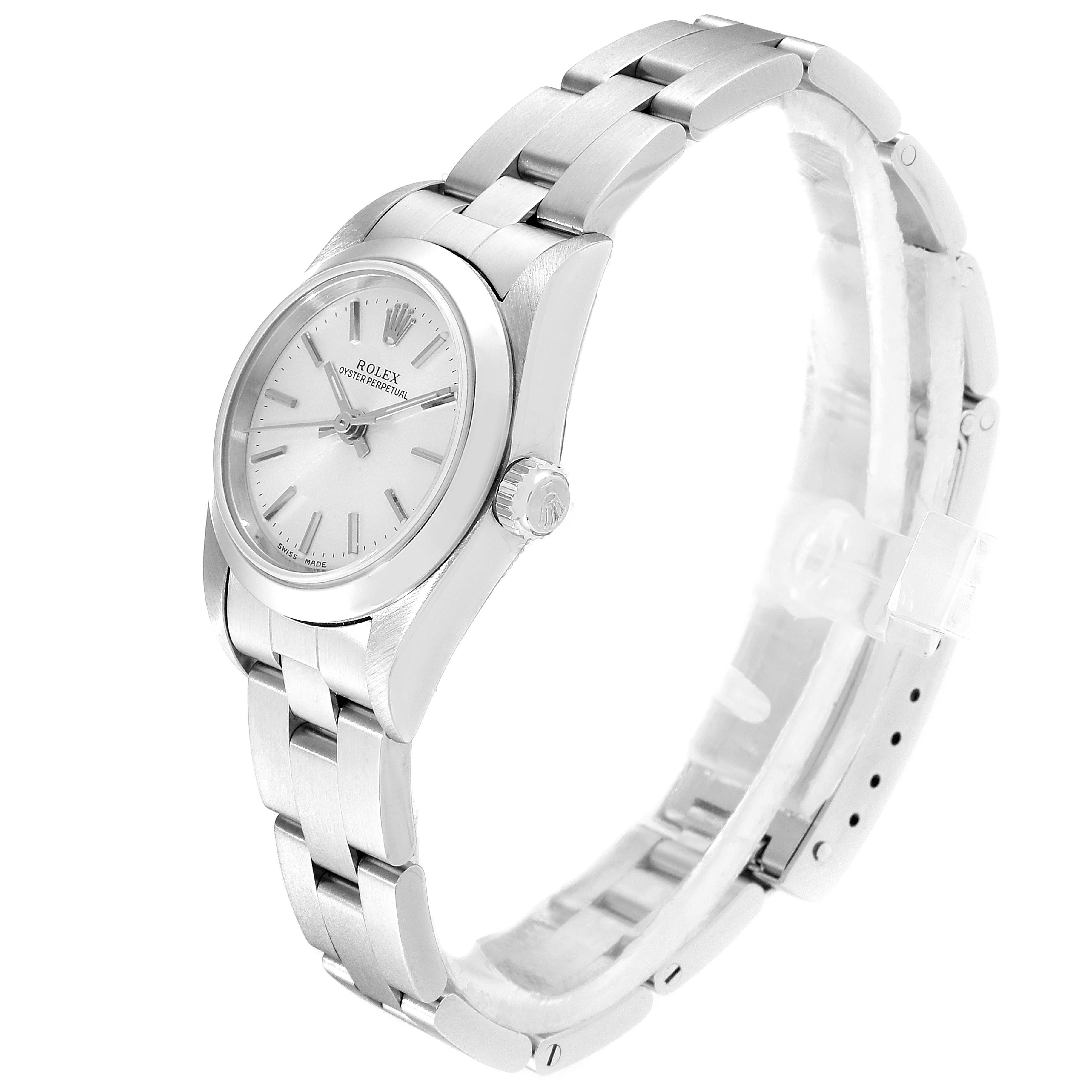 The Rolex Oyster Perpetual 76080 Women's Stainless Steel Silver Dial 76080 Women's Stainless Steel Silver Dial watch is shown from a side-angle, highlighting the face, crown, and bracelet.