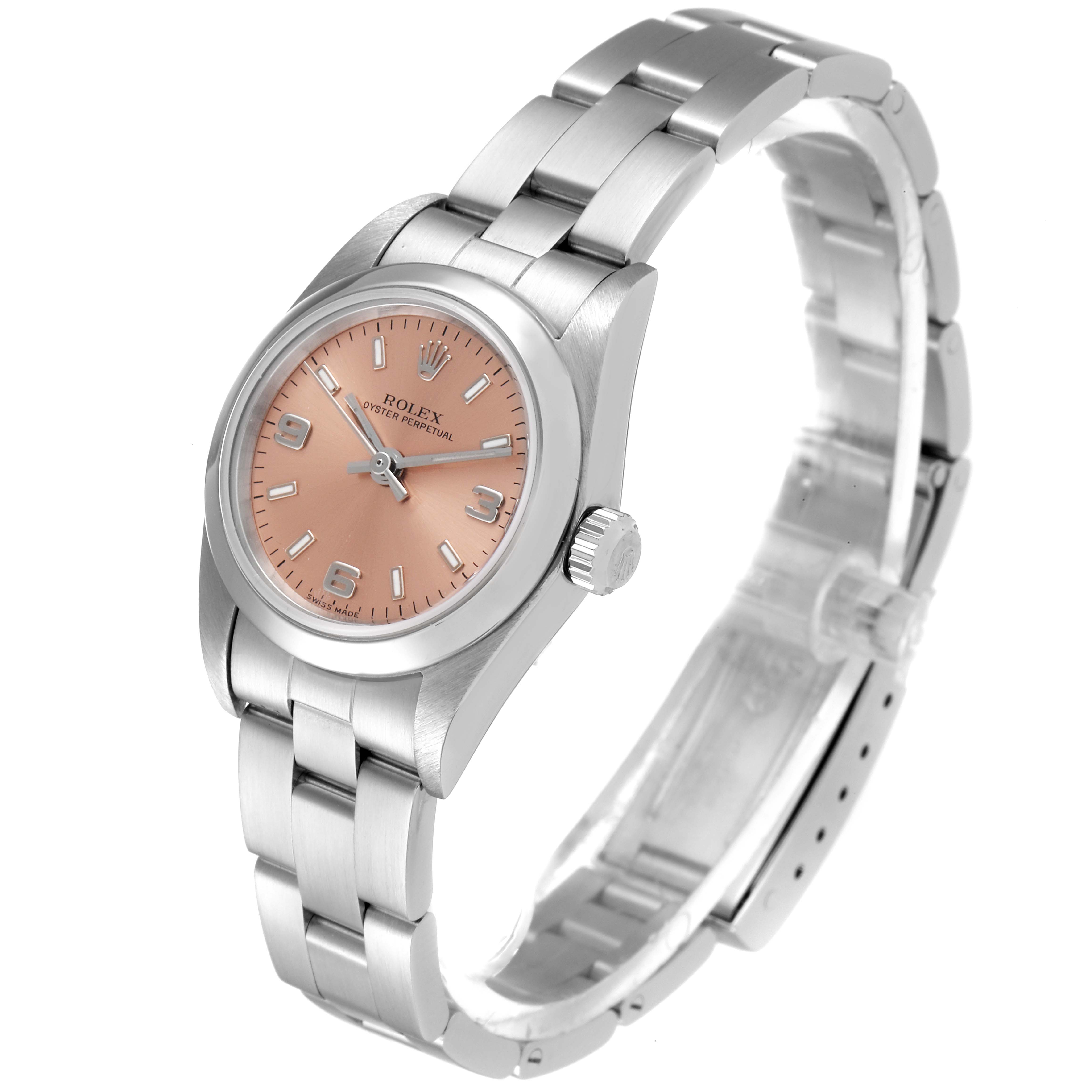 This image shows a Rolex Oyster Perpetual 76080 Women's Stainless Steel Pink Dial 76080 Women's Stainless Steel Pink Dial watch at a three-quarter angle, highlighting the dial, bezel, bracelet, and crown.