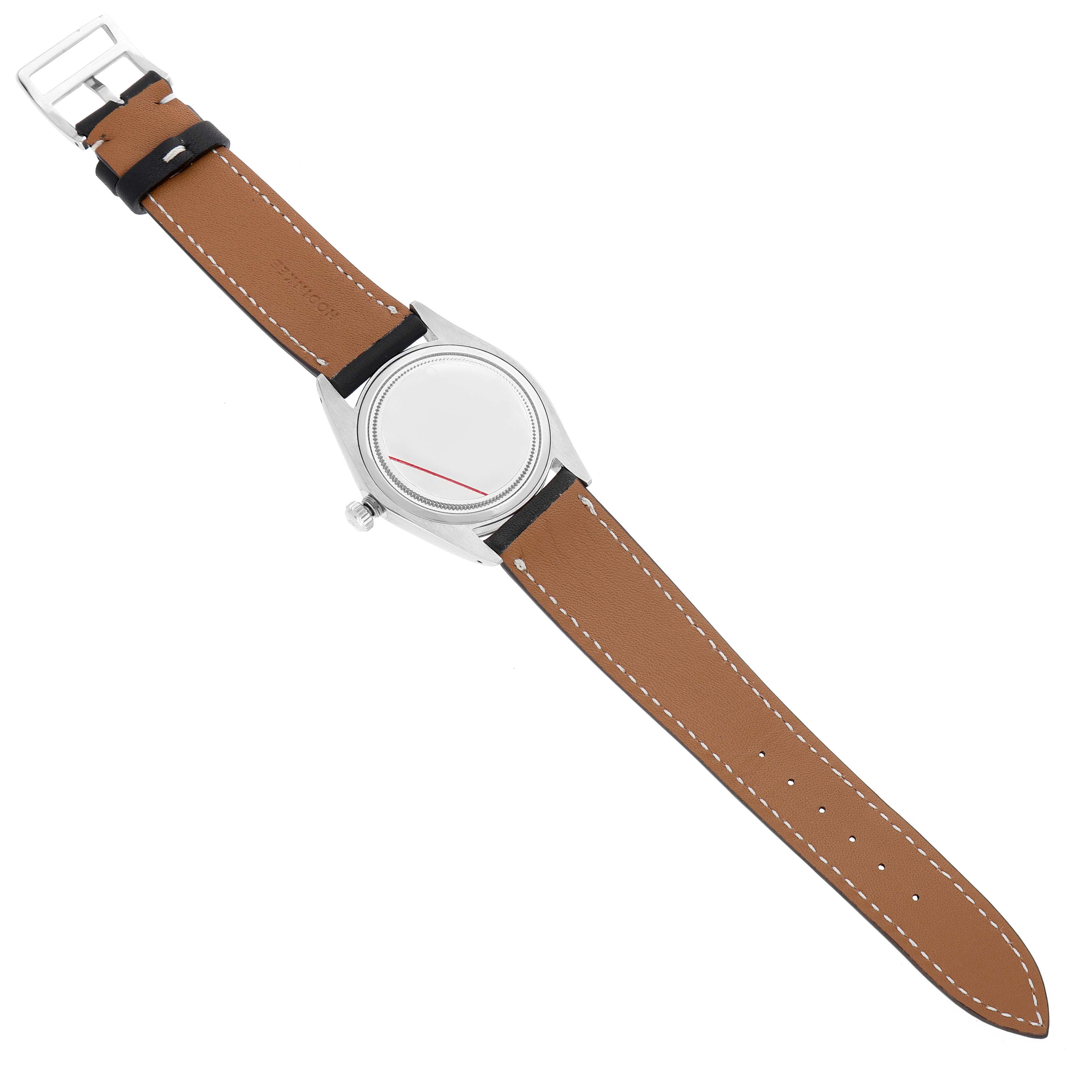 The Rolex Vintage Collection 6694 Men's Stainless Steel Champagne Dial watch is shown from the top, highlighting the dial, case, and brown leather strap with buckle.