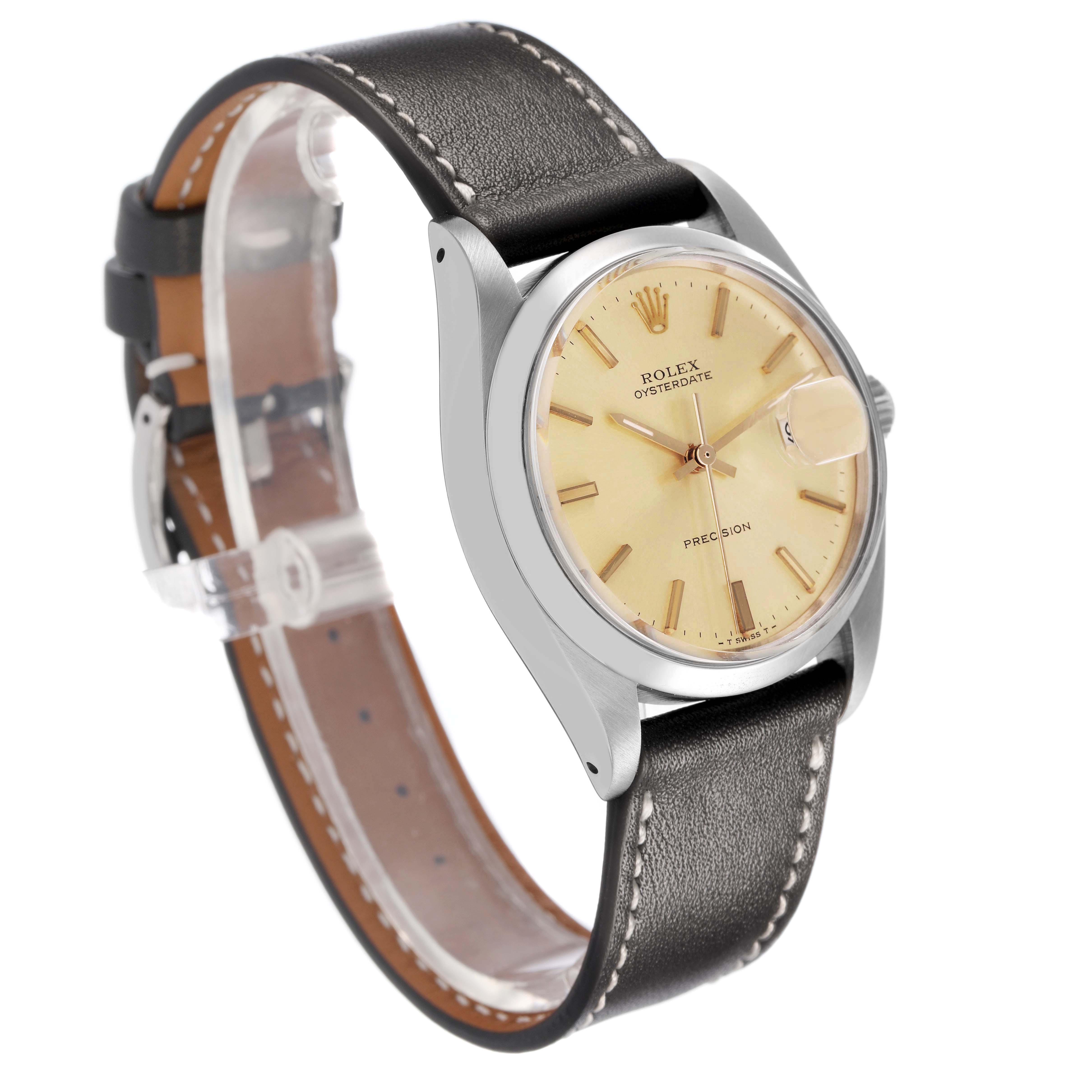 The Rolex Vintage Collection 6694 Men's Stainless Steel Champagne Dial watch is shown at a three-quarter angle, highlighting the face, case, and leather strap.