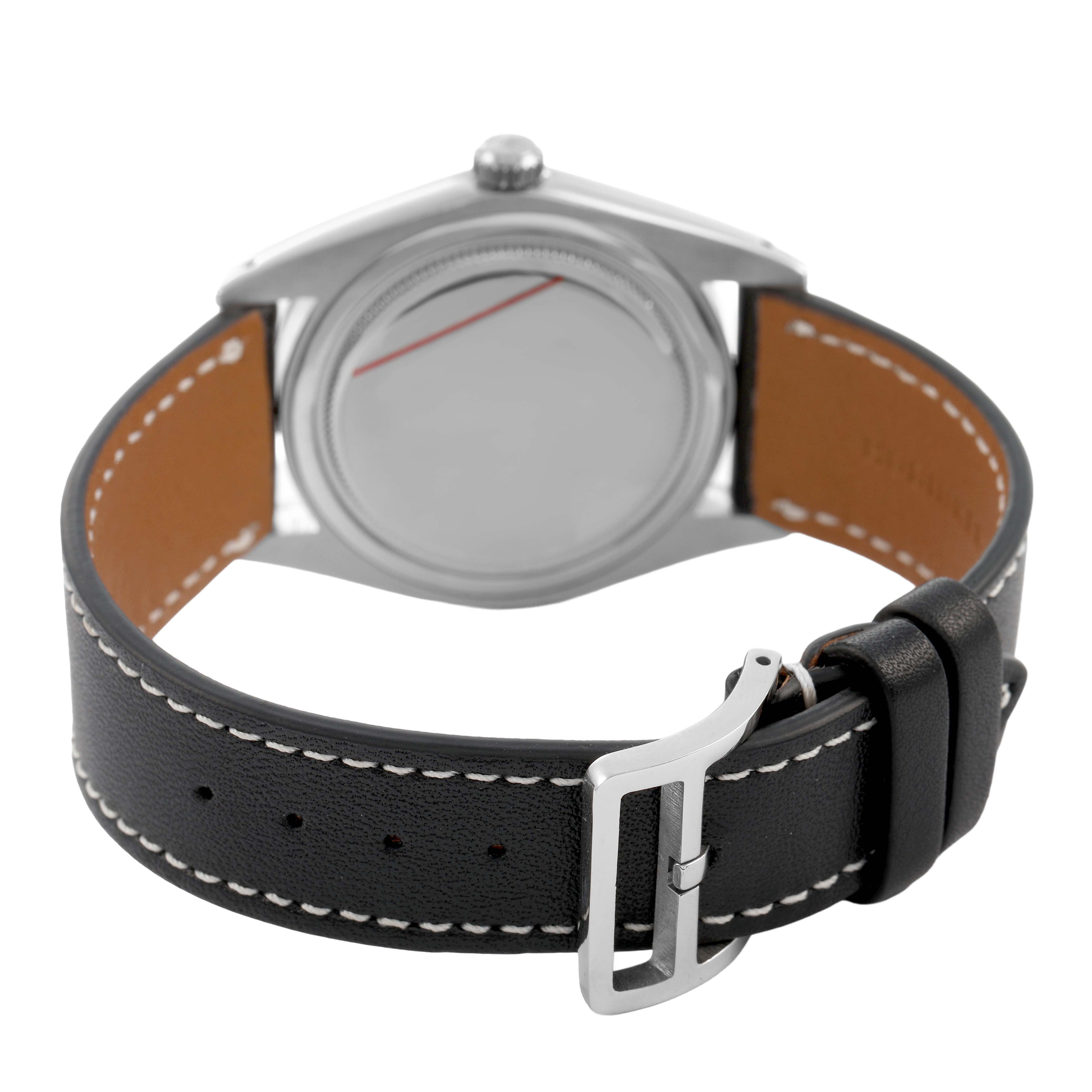 The Rolex Vintage Collection 6694 Men's Stainless Steel Champagne Dial watch is shown from the back, highlighting the leather strap and clasp.