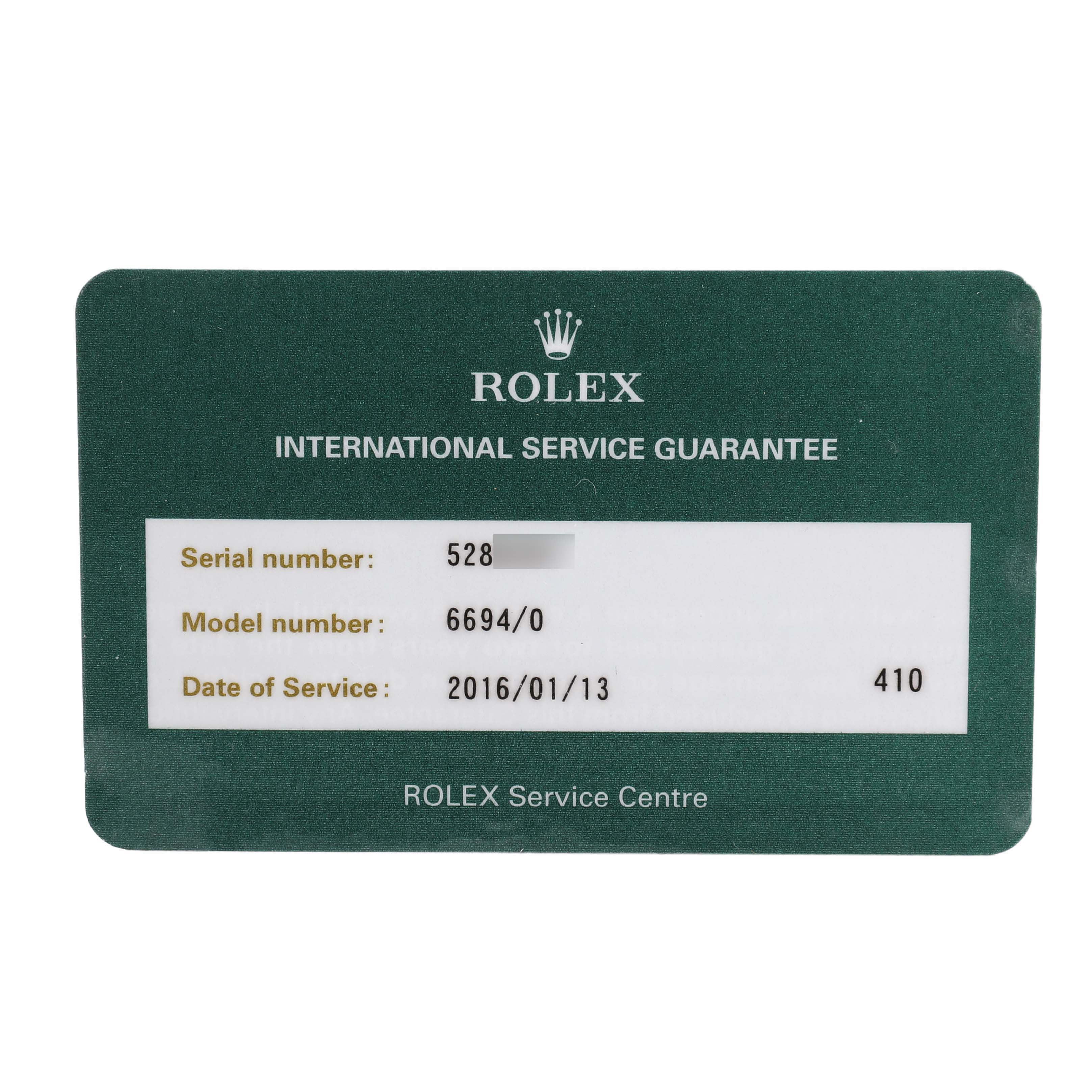 The image shows a Rolex International Service Guarantee card for a Vintage Collection model, displaying serial and model numbers.
