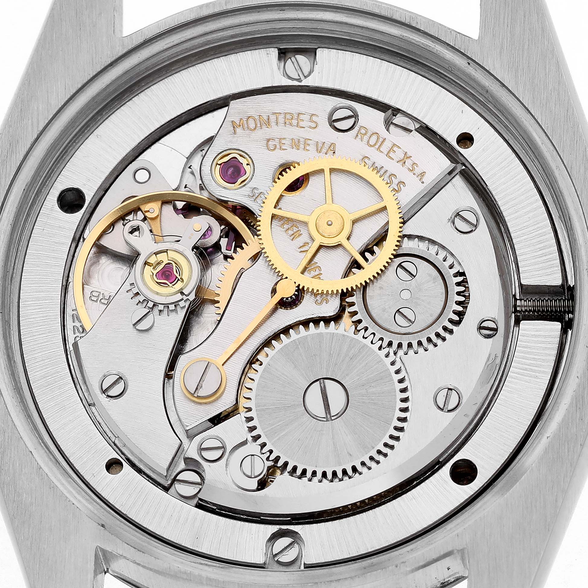 The image shows the intricate inner mechanical movement of a Rolex Vintage Collection 6694 Men's Stainless Steel Champagne Dial watch from a top-down angle.