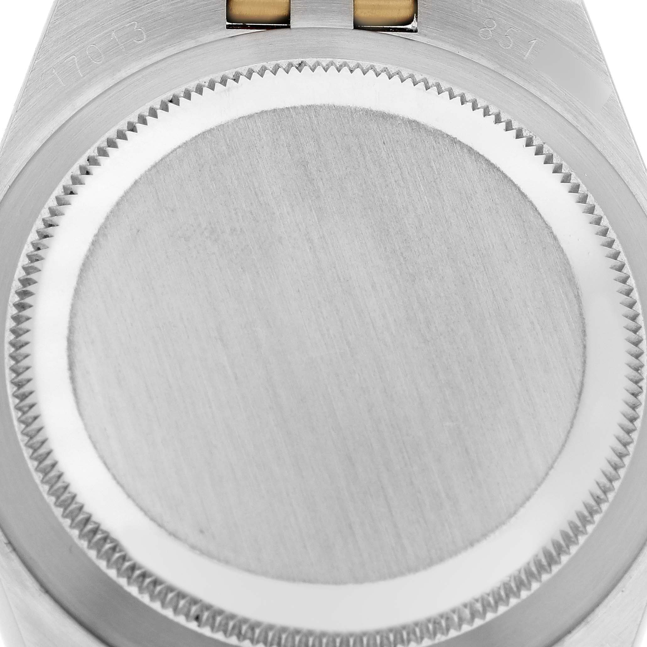 This image shows the case back of the Rolex Oysterquartz 17013 Men's Steel and Gold (two tone) Champagne Dial 17013 Men's Steel and Gold (two tone) Champagne Dial watch.