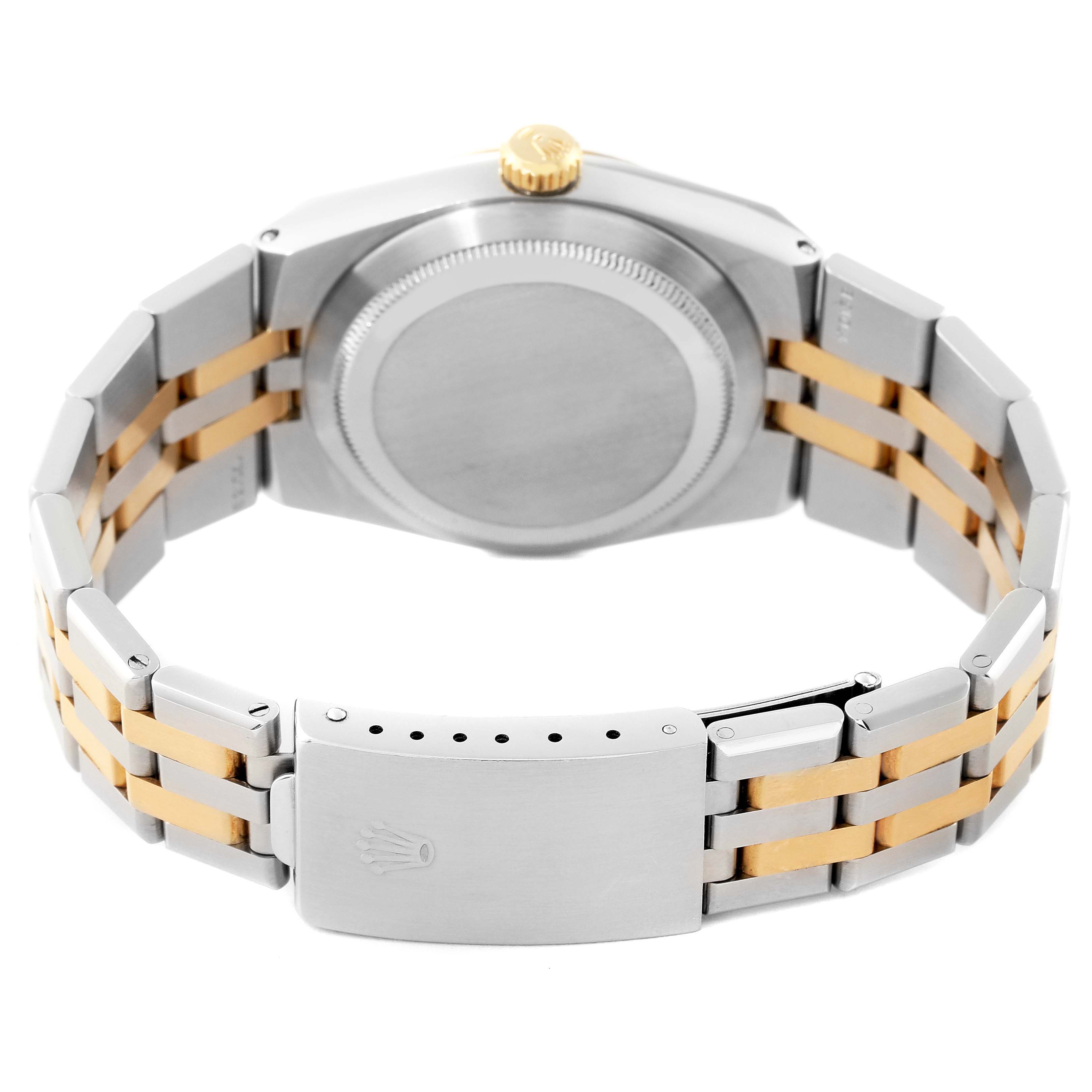 The image shows the back case and bracelet of a Rolex Oysterquartz 17013 Men's Steel and Gold (two tone) Champagne Dial 17013 Men's Steel and Gold (two tone) Champagne Dial watch, with a two-tone metal design.