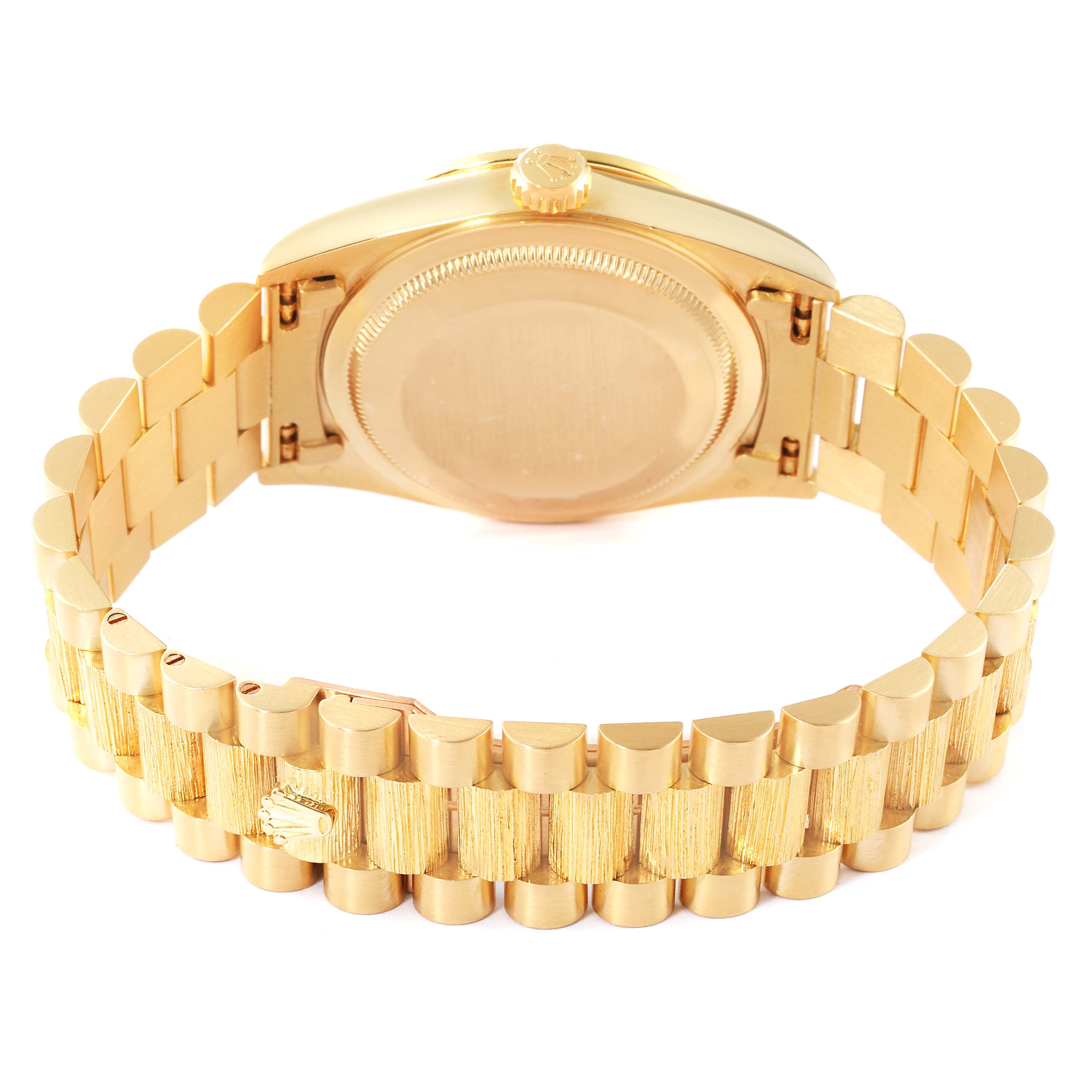 The image shows the back case and bracelet of a Rolex President 18308 Men
s Yellow Gold Champagne Dial 18308 Men
s Yellow Gold Champagne Dial model watch, taken from a rear angle.