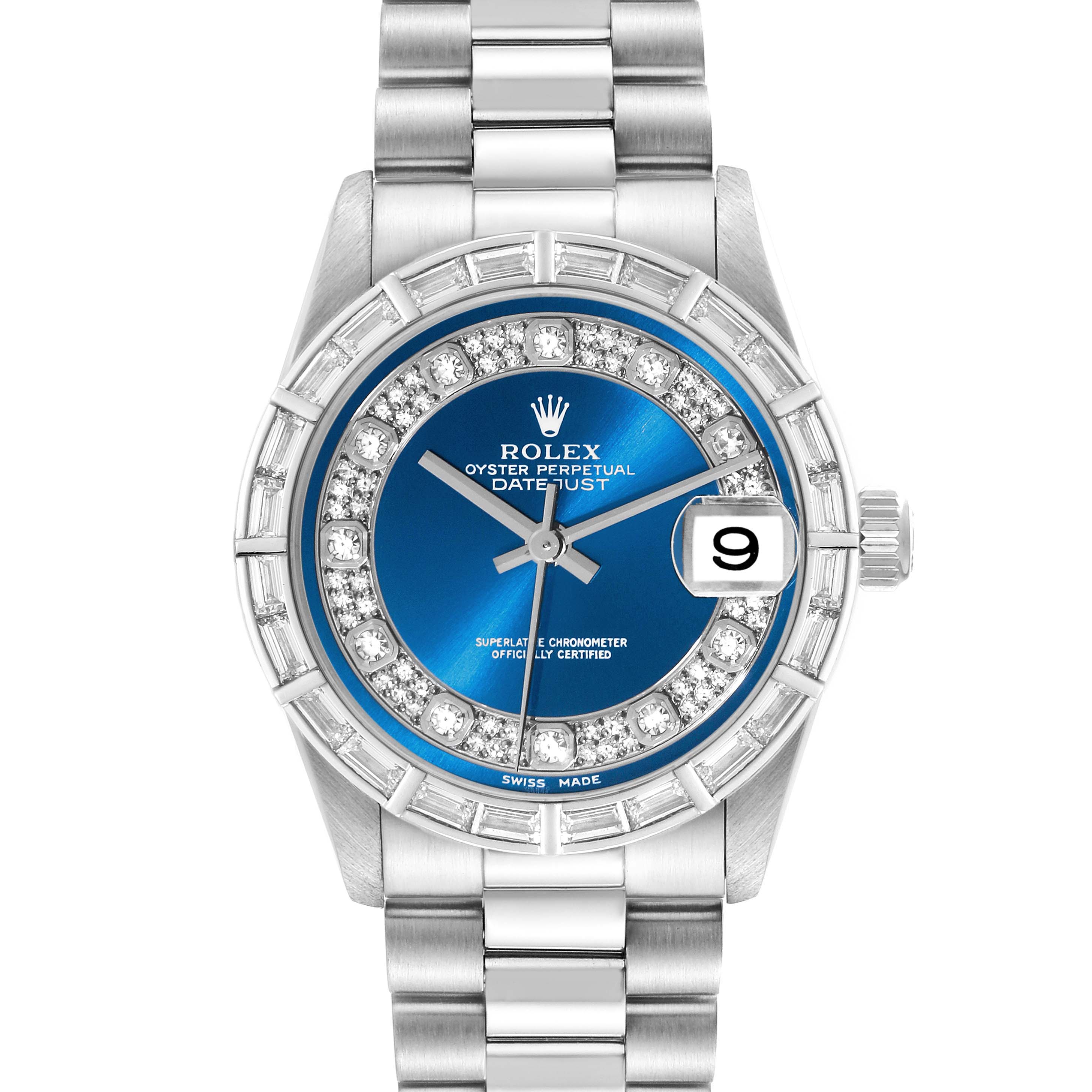 The image shows a front view of a Rolex President 78266 Women
s Platinum Blue Dial 78266 Women
s Platinum Blue Dial model, featuring a blue dial, date window, and diamond bezel.