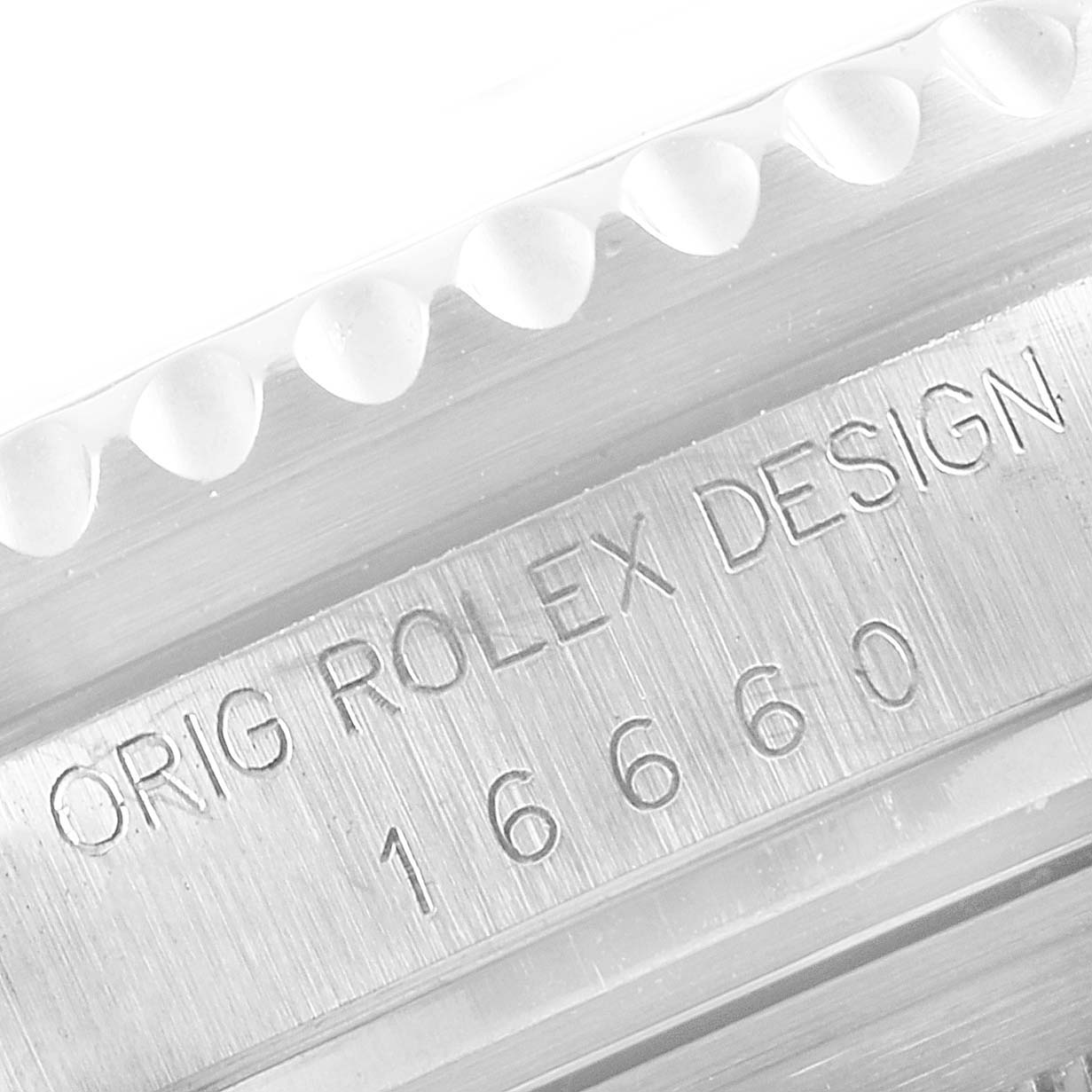 A close-up angle showing the engraved case side of the Rolex Vintage Collection 16660 Men's Stainless Steel Black Dial 16660 Men's Stainless Steel Black Dial model with the design number 16660.