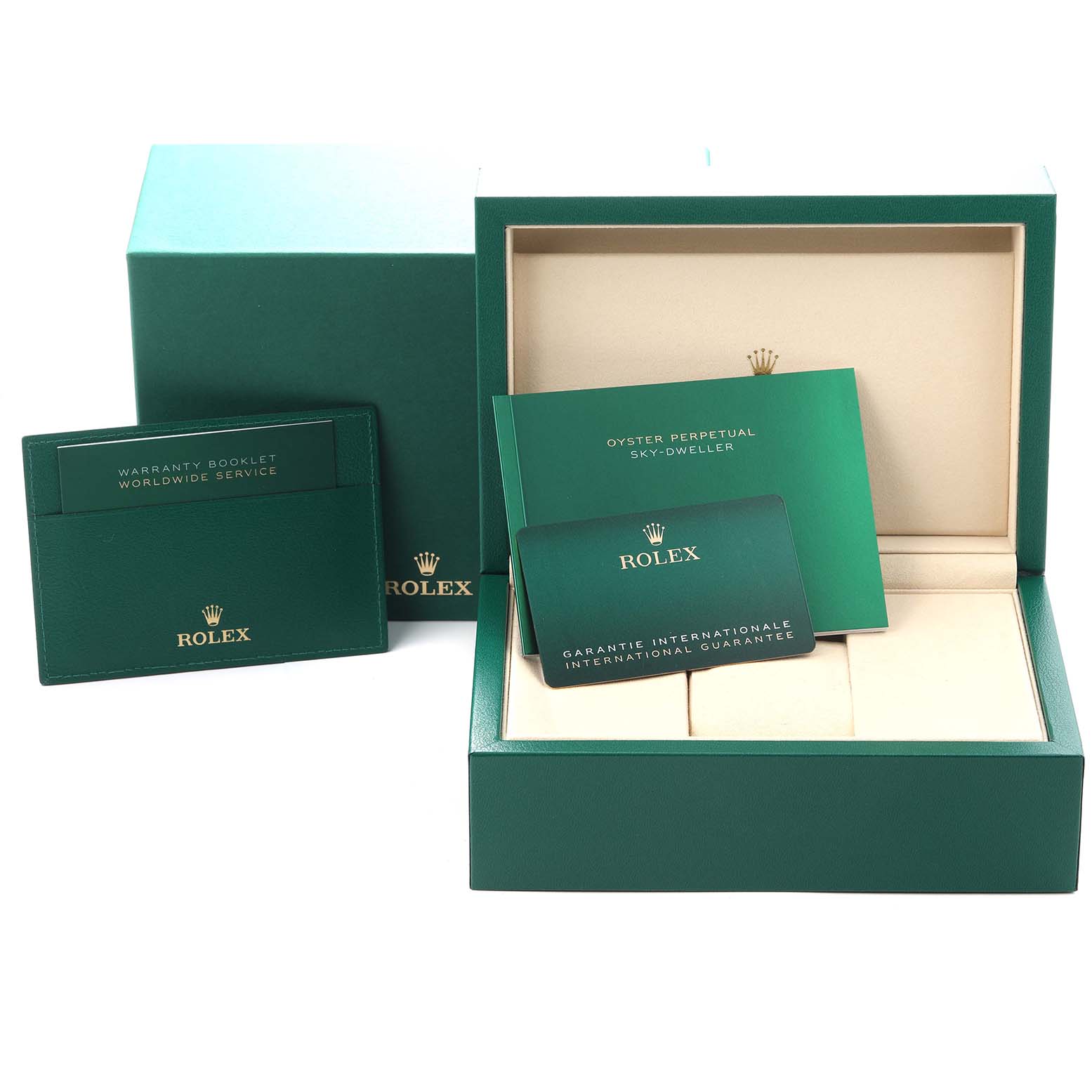 The image shows the packaging and accessories for a Rolex Sky-Dweller model 336934, including a box, warranty booklet, and guarantee card.