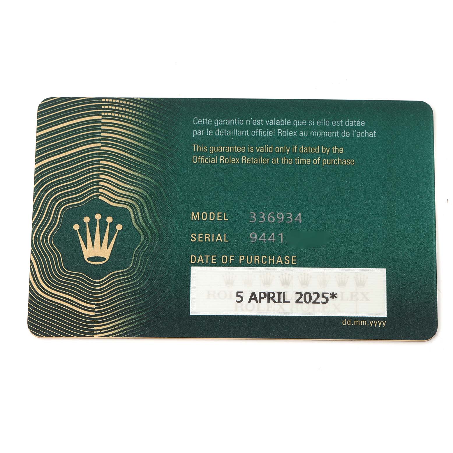 The image shows a warranty card for a Rolex Sky-Dweller model, displaying the model number 336934, serial number, and purchase date.