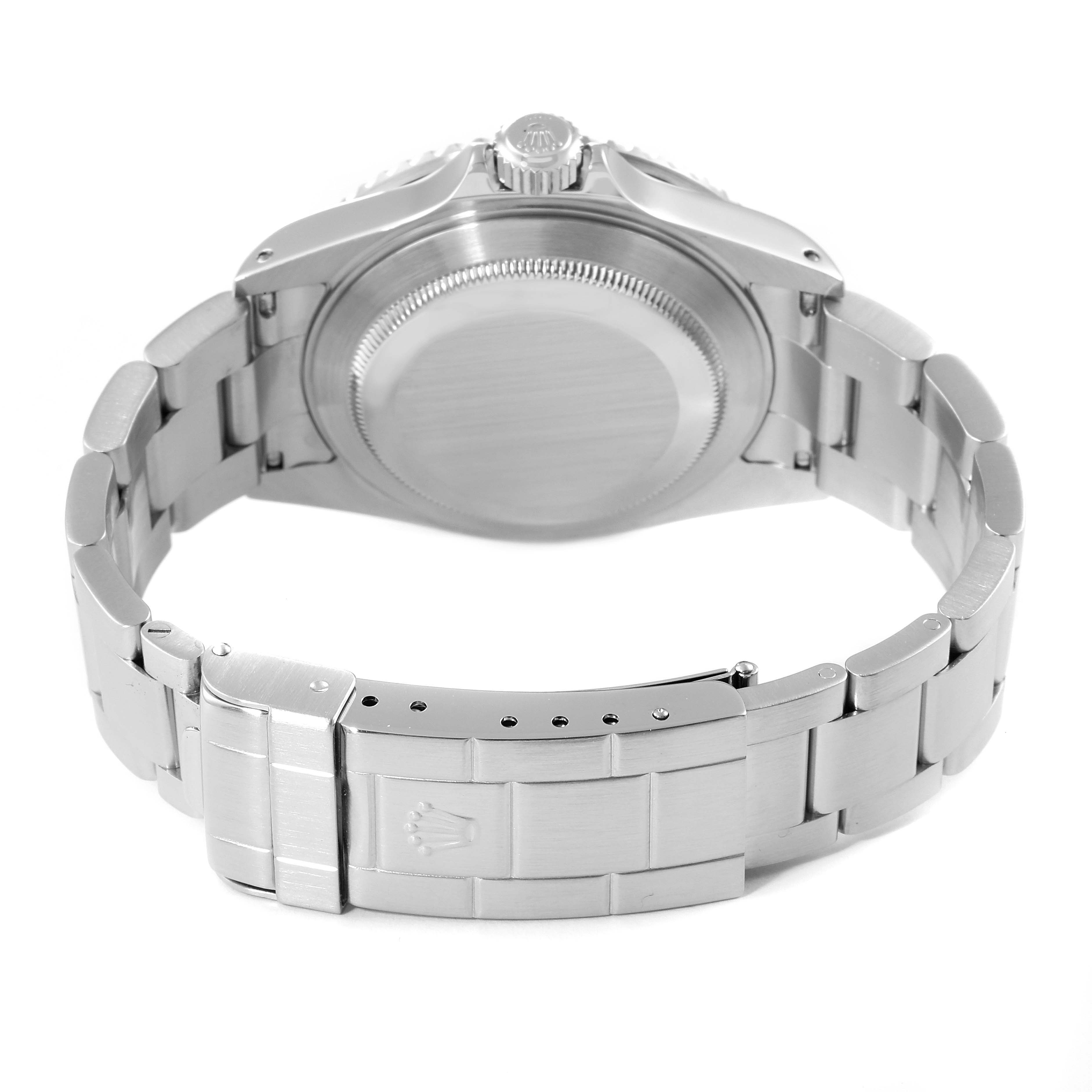 This image shows the back view of a Rolex Submariner 16610 Men
s Stainless Steel Black Dial 16610 Men
s Stainless Steel Black Dial watch, highlighting its case back, clasp, and bracelet.